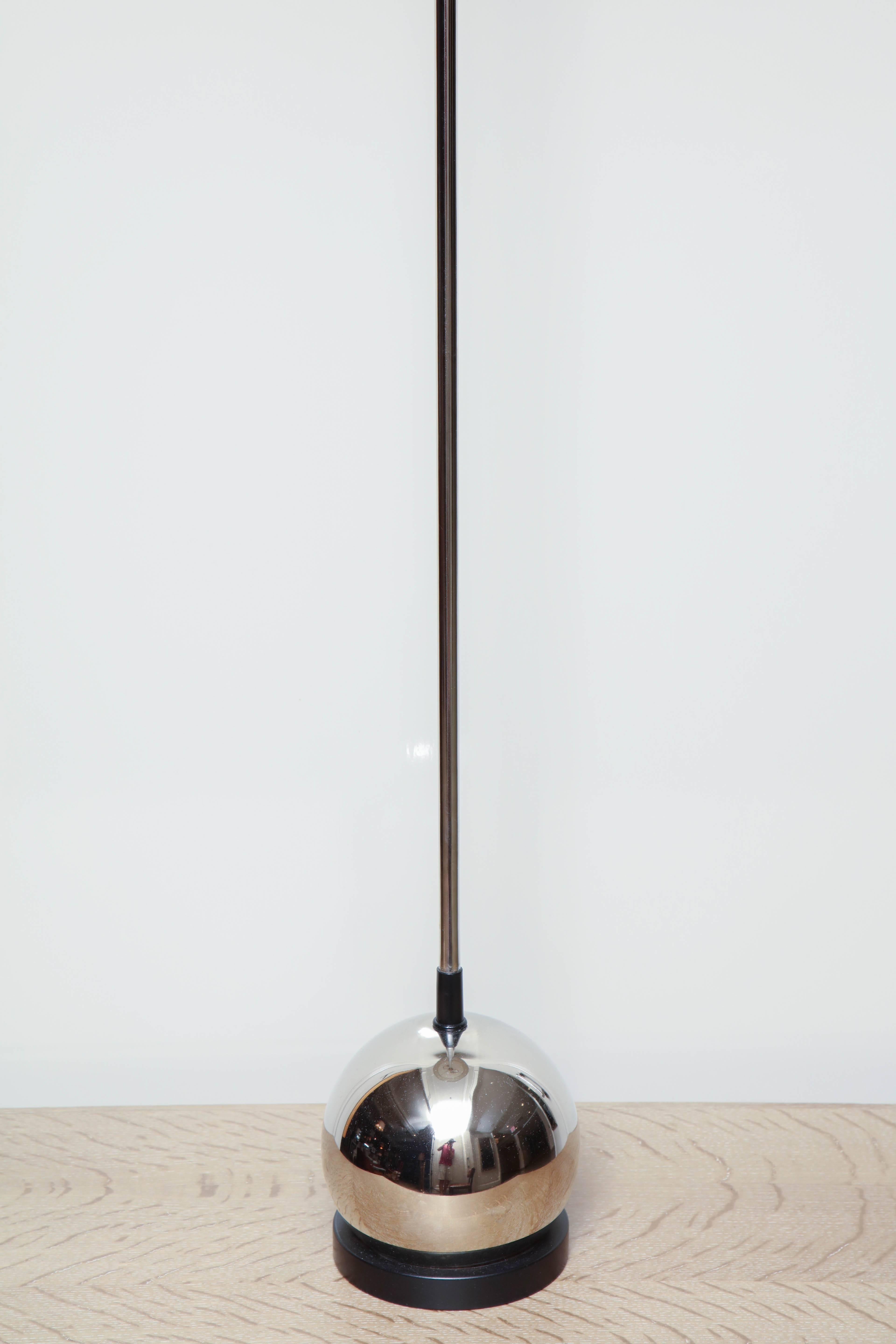 Chrome floor lamp with spherical base in the manner of Chase, circa 1940 celadon semi-enclosed silk drum shade.