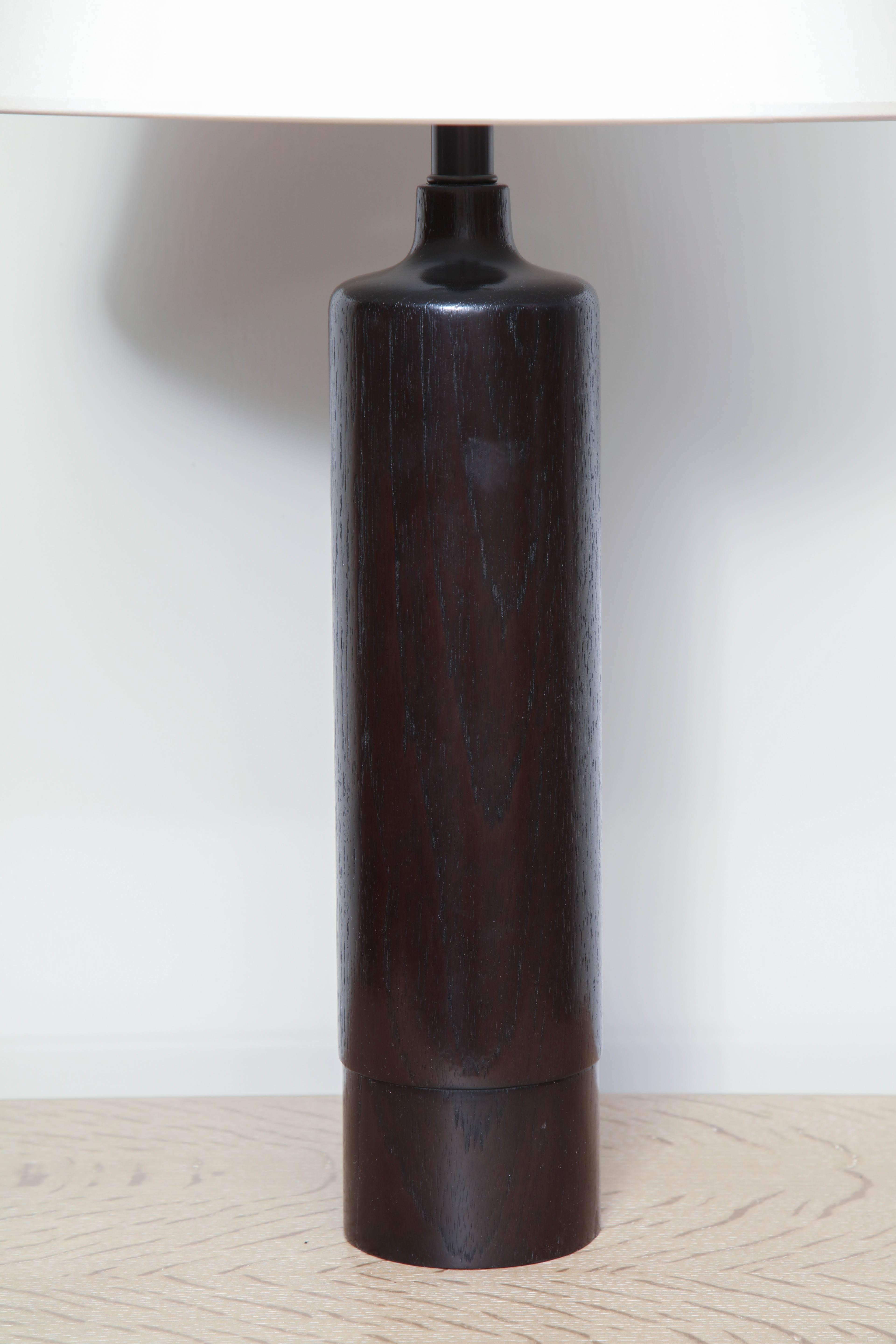 Ebonized turned oak Danish table lamp with bronze hardware and dimmer socket, circa 1950.