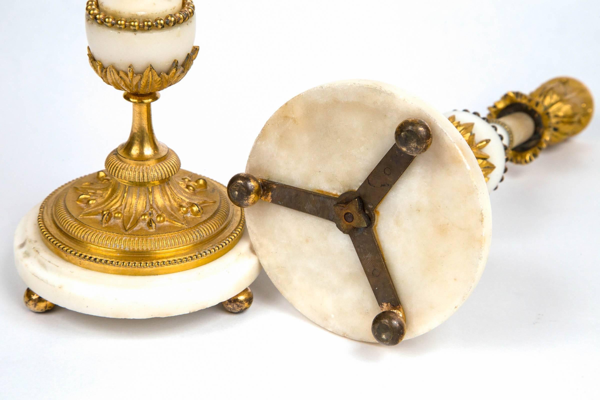 Pair of White Marble and Gilt Bronze, Late 18th Century Baltic Candlesticks 1