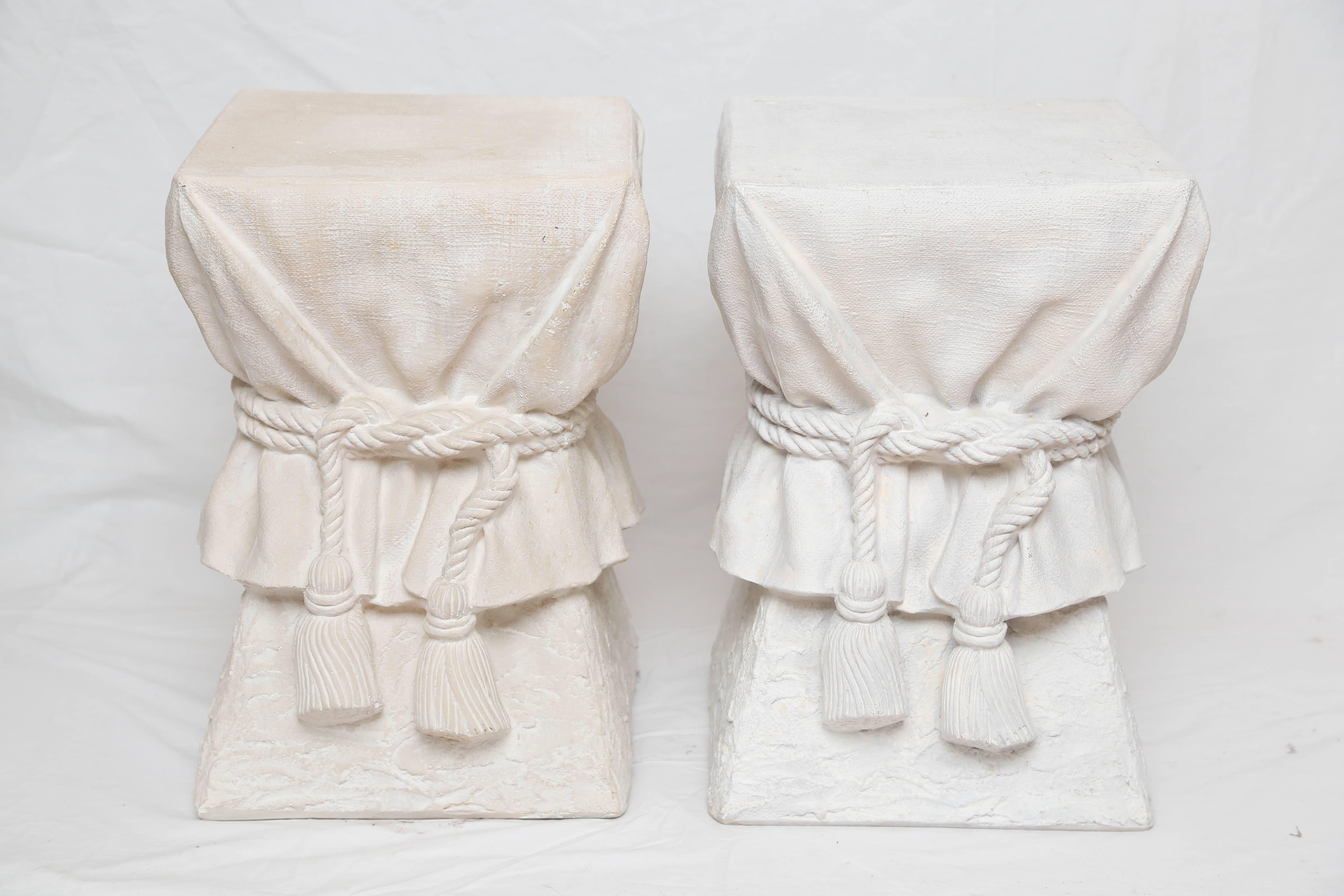 Pair of white tasseled plaster end tables attributed to John Dickinson.