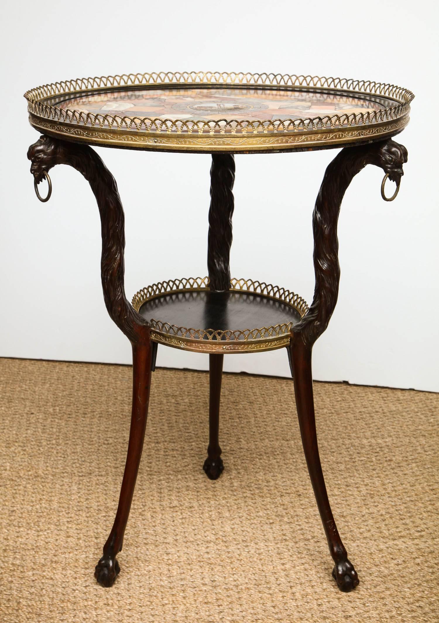 Very Fine Austrian Neoclassical gueridon table with gilt brass pierced gallery, the specimen marble top with Roman micro-mosaic center depicting ruins, having porphyry and malachite border, the body comprising random shaped specimen hardstones