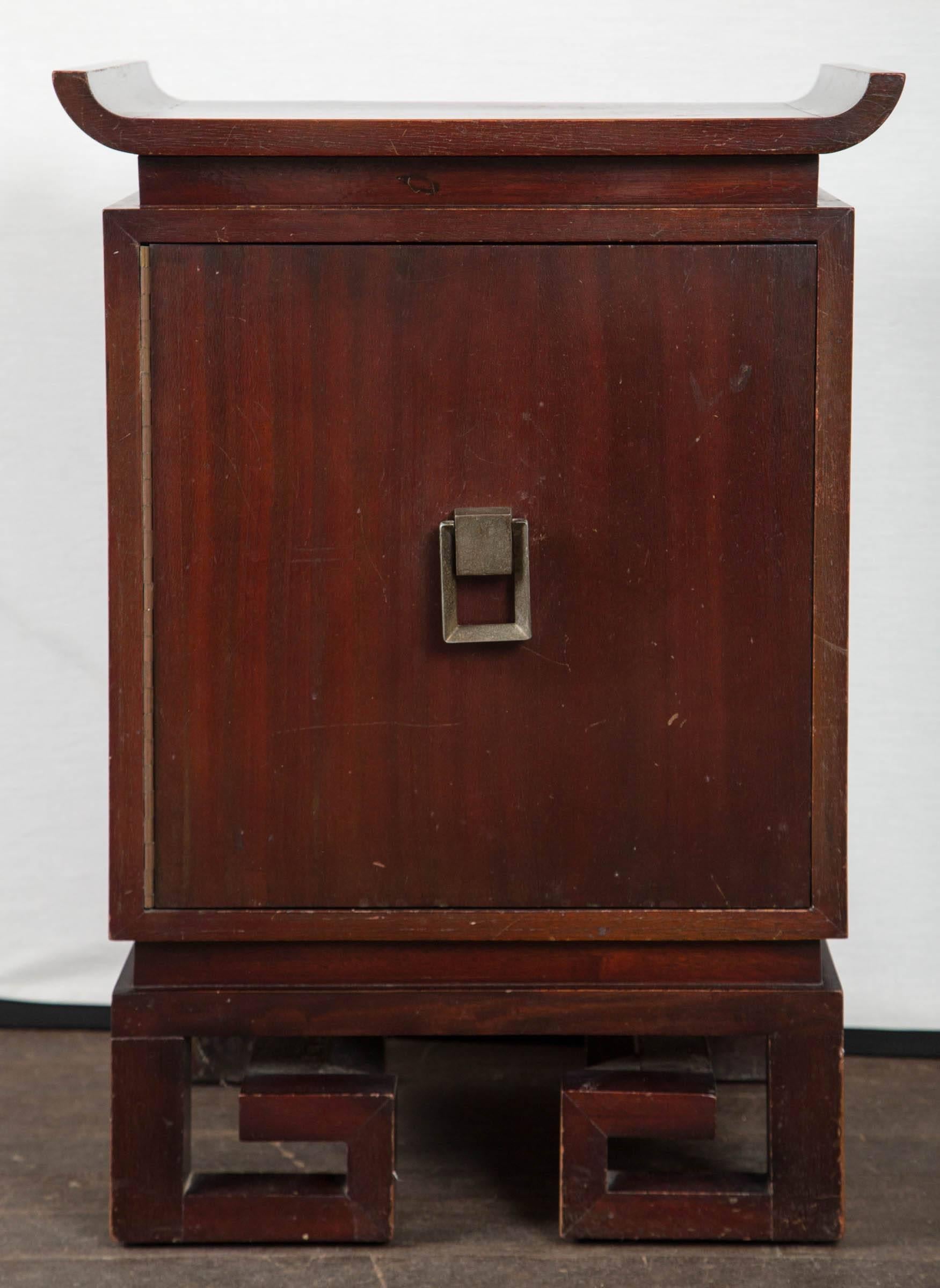 Asian James Mont style pair of cabinets. Great chinoiserie details, good looking pulls. Ready for a new lacquer finish or a good wood polish.
Flat surface is 27 inches high.
 