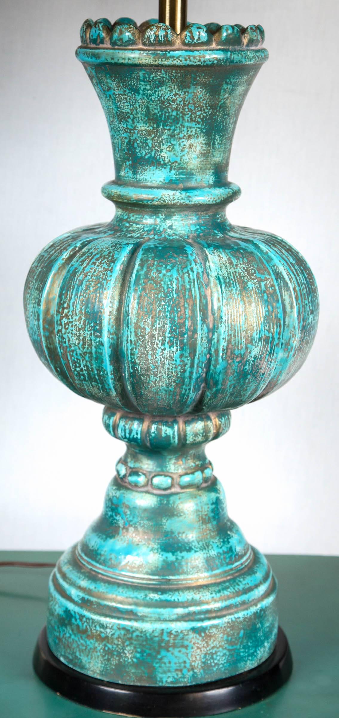 Deep turquoise pottery lamp in the style of Marbro. Dimensions below height is to top of socket, diameter is body of lamp. Shade is 20 inches in diameter. Overall height with shade is 40.75 inches. Holds one standard bulb.