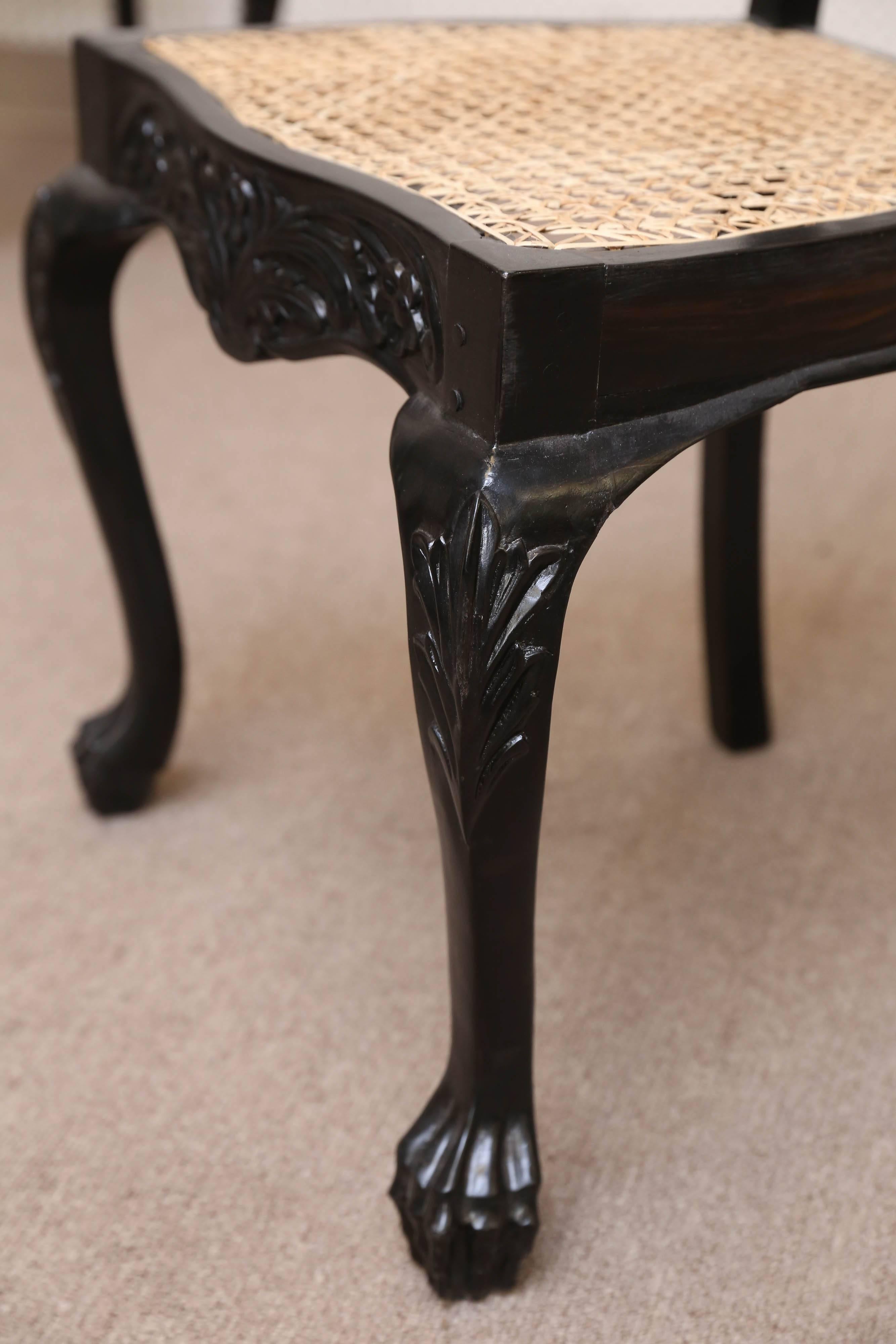 Four Mid-19th Century Exquisitely Carved Solid Ebony and Cane Side Chairs In Good Condition For Sale In Houston, TX