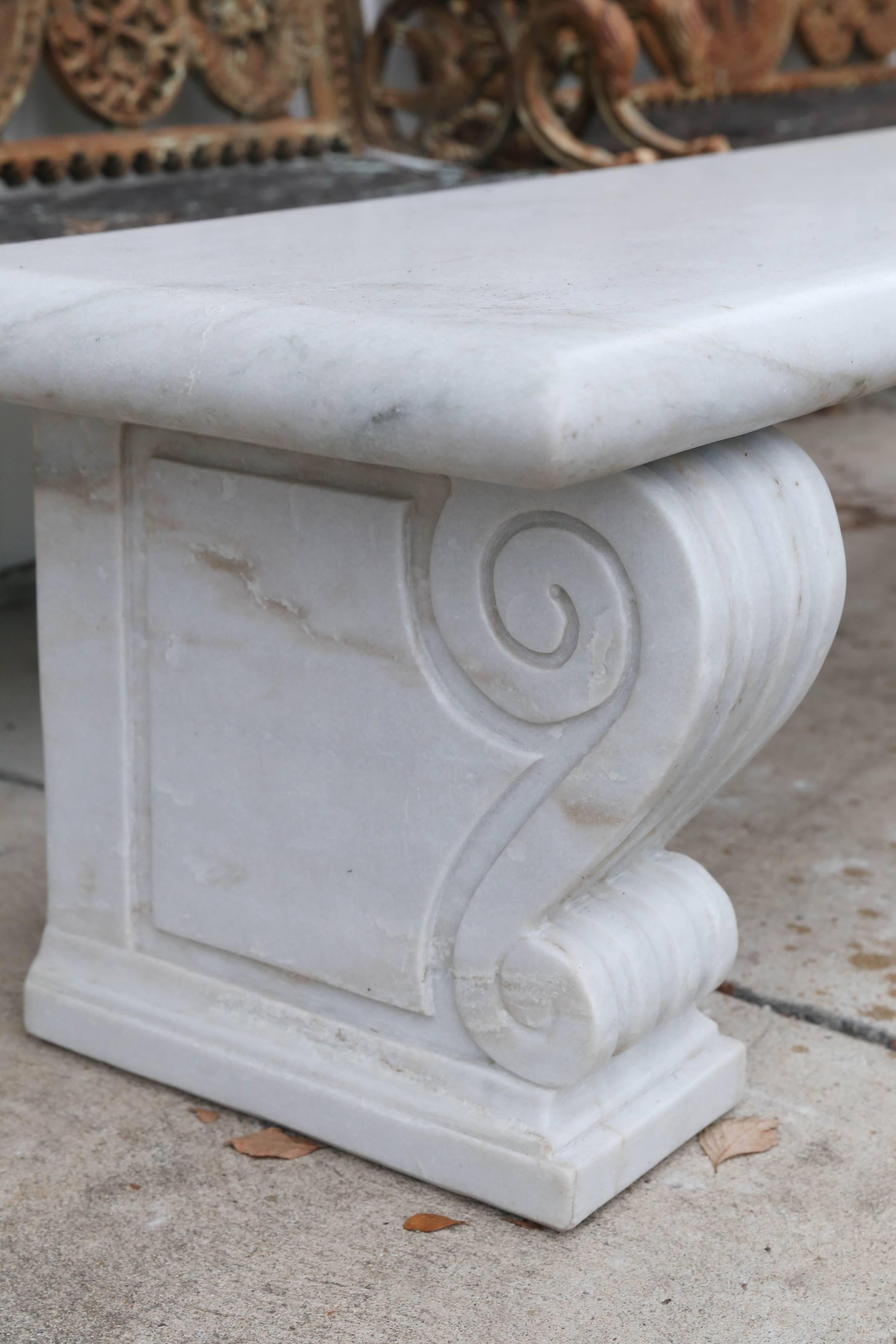 Fine solid hand-carved marble bench is from a park in India.
The bench is made up of three parts. The bench is for out door use.
The bench will last for generations.

 