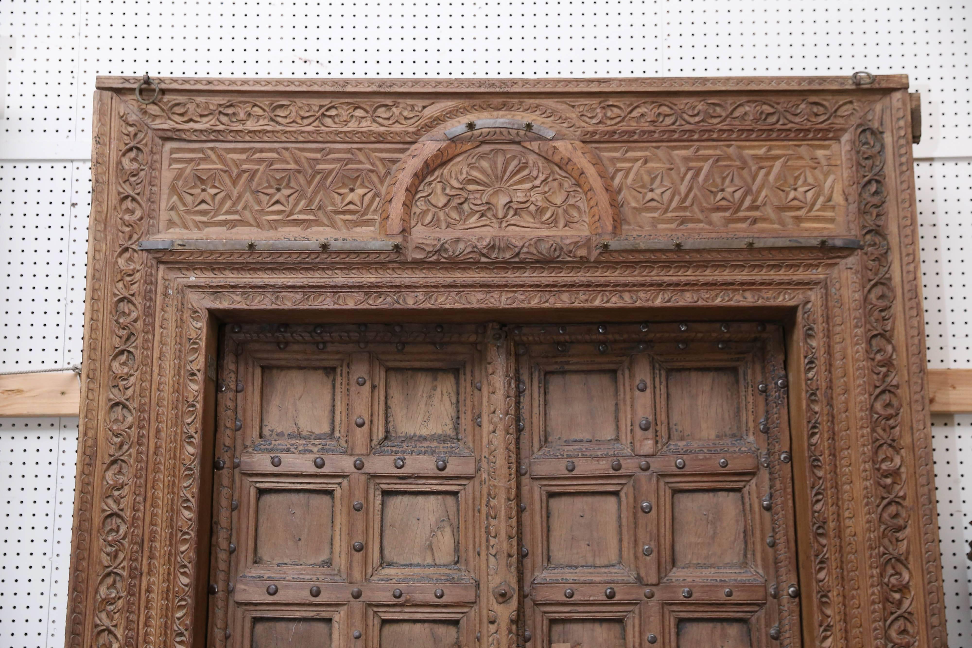 It is in remarkable shape after weathering nearly 200 years of sun, rain and wind. This door was built to resist armed intruders. It was built at a time when feudal wars were common and there was no 911. The doors are reinforced with hand made iron