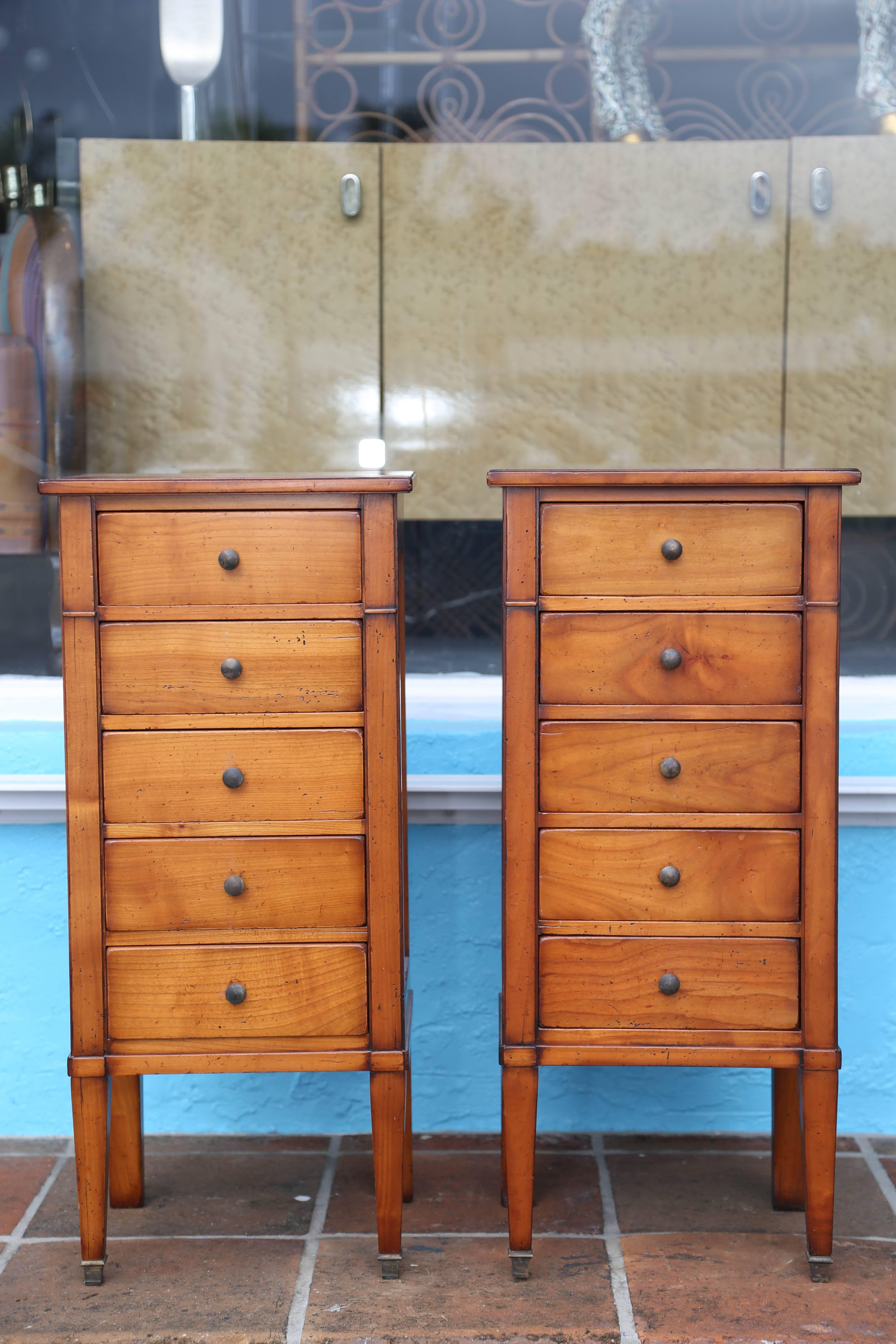 An eye-catching pair of superb quality. Each is fitted with five drawers.