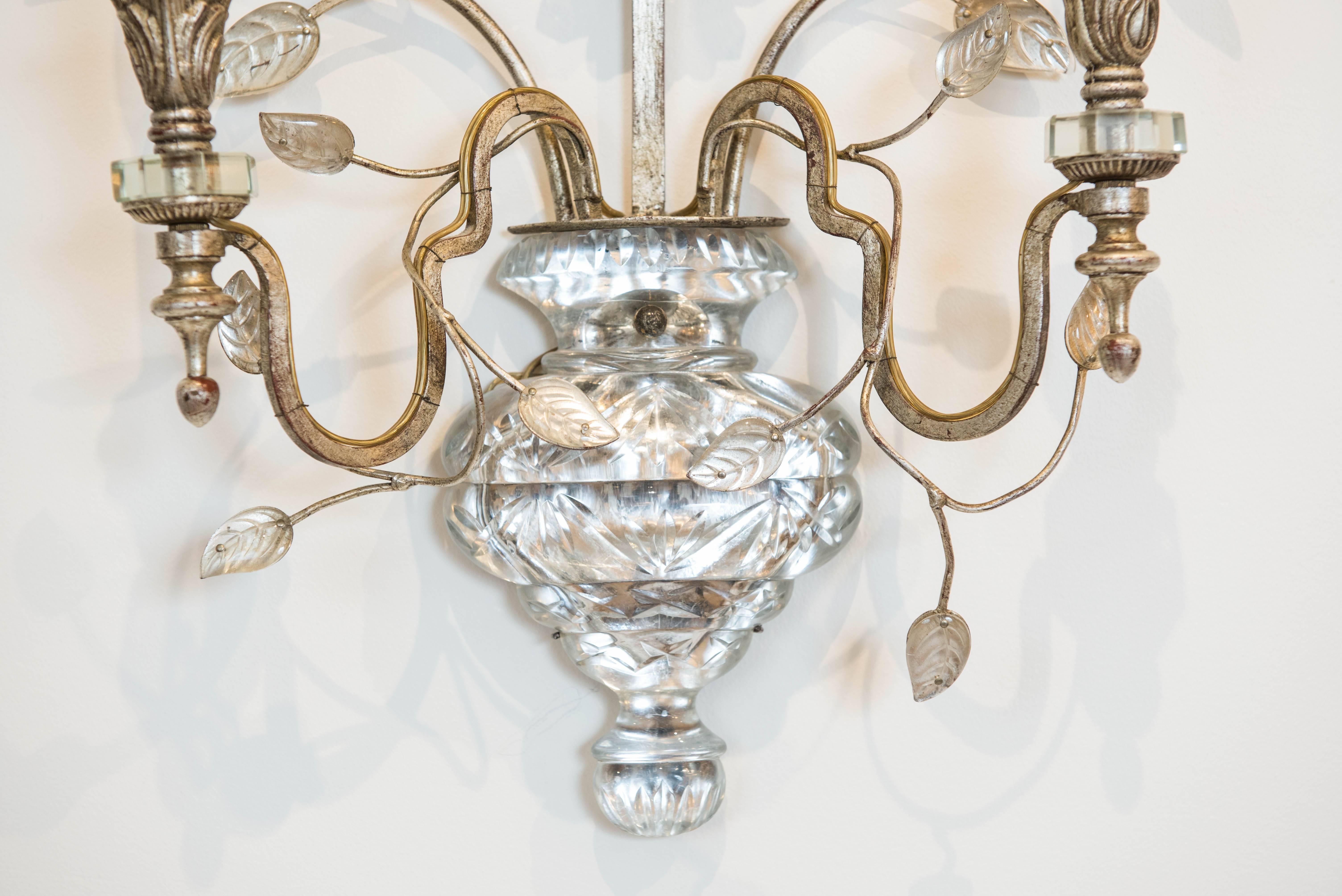 This large and impressive two-light glass and silver leaf sconce is wired for North America and ready to be installed.
It is urn shaped with a sprouting glass and metal foliage. 

 