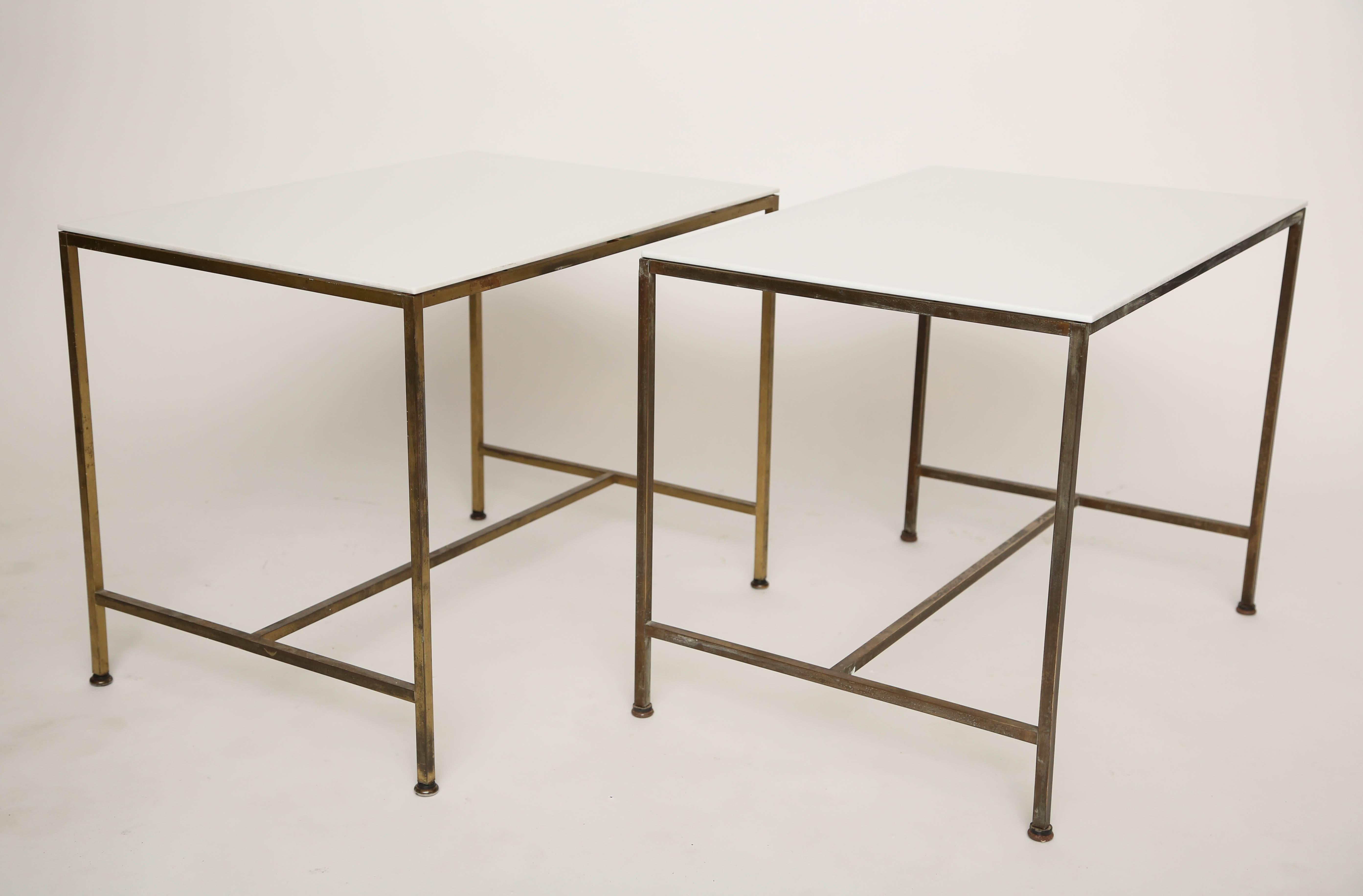 A fine pair of architectural tables manufactured by Calvin.
White glass top's.