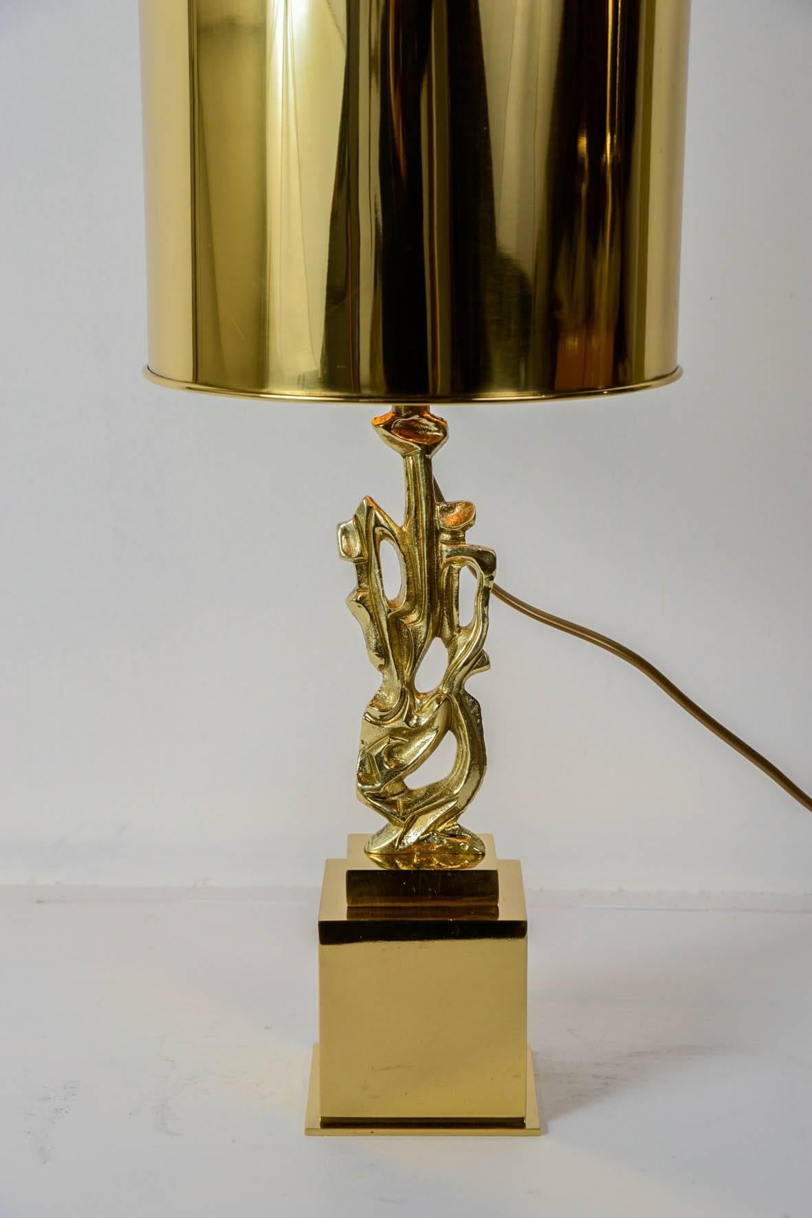 Pair of sculptural bronze lamps
signed.