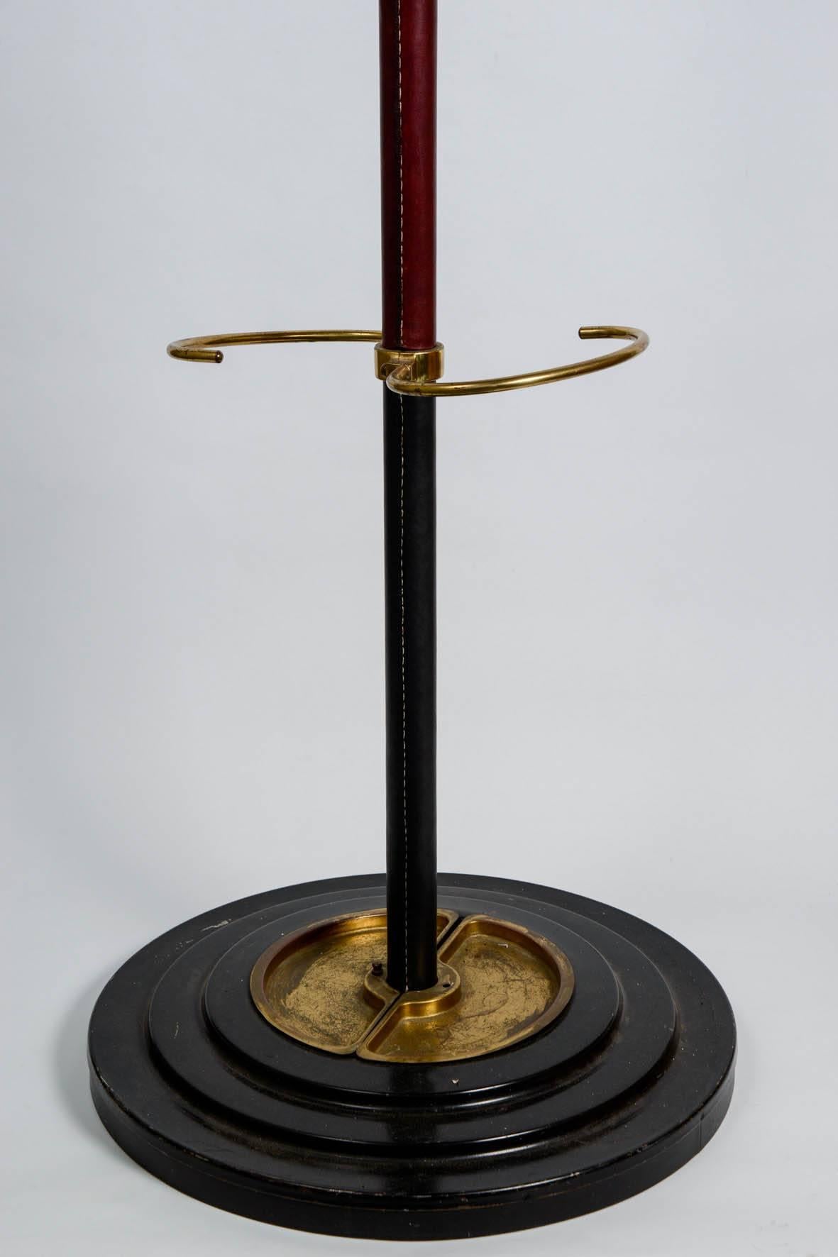 1950s stitched leather coat stand designed by Jacques Adnet.