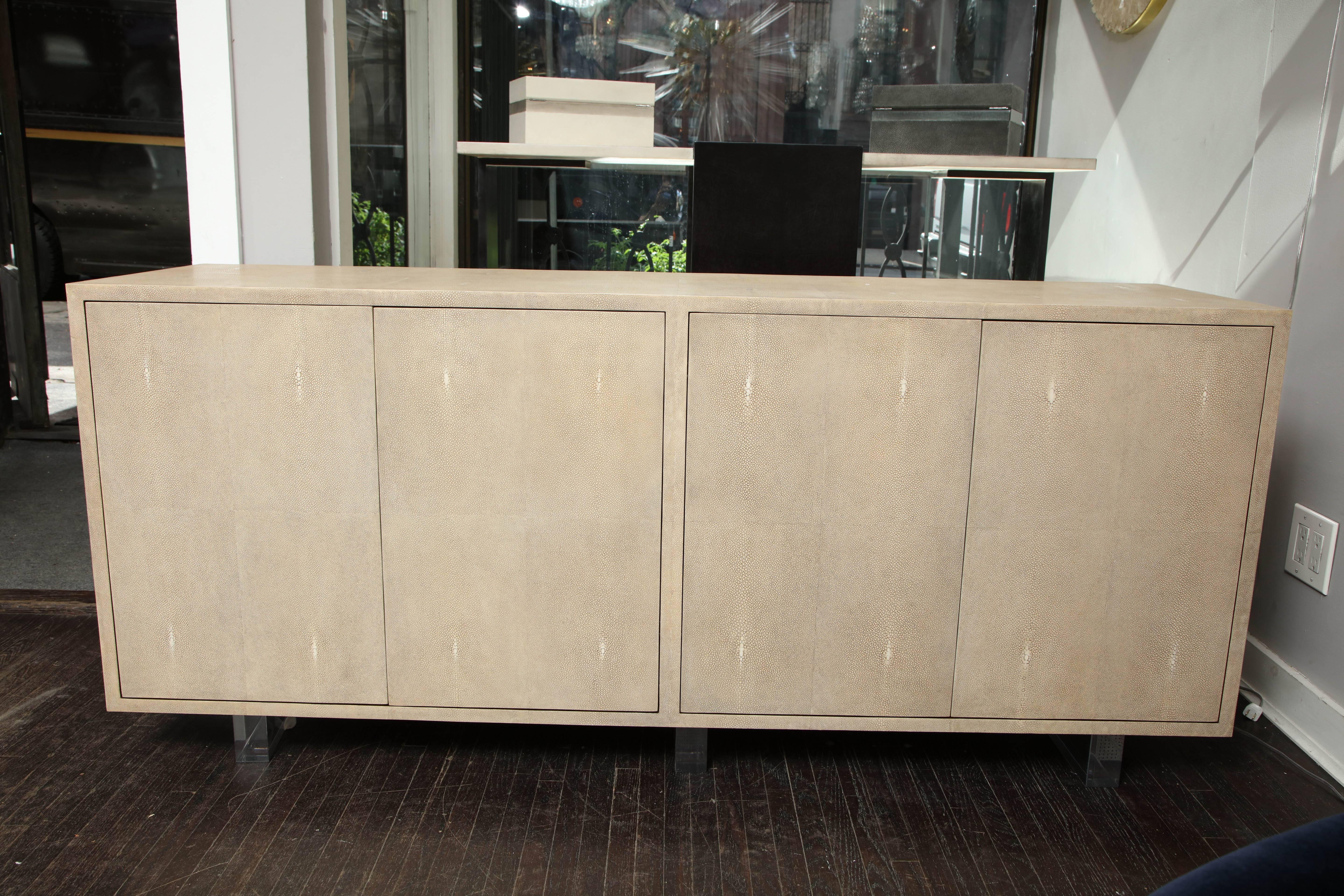 Genuine shagreen sideboard floating on acrylic base. Customization is available in different sizes and colors.