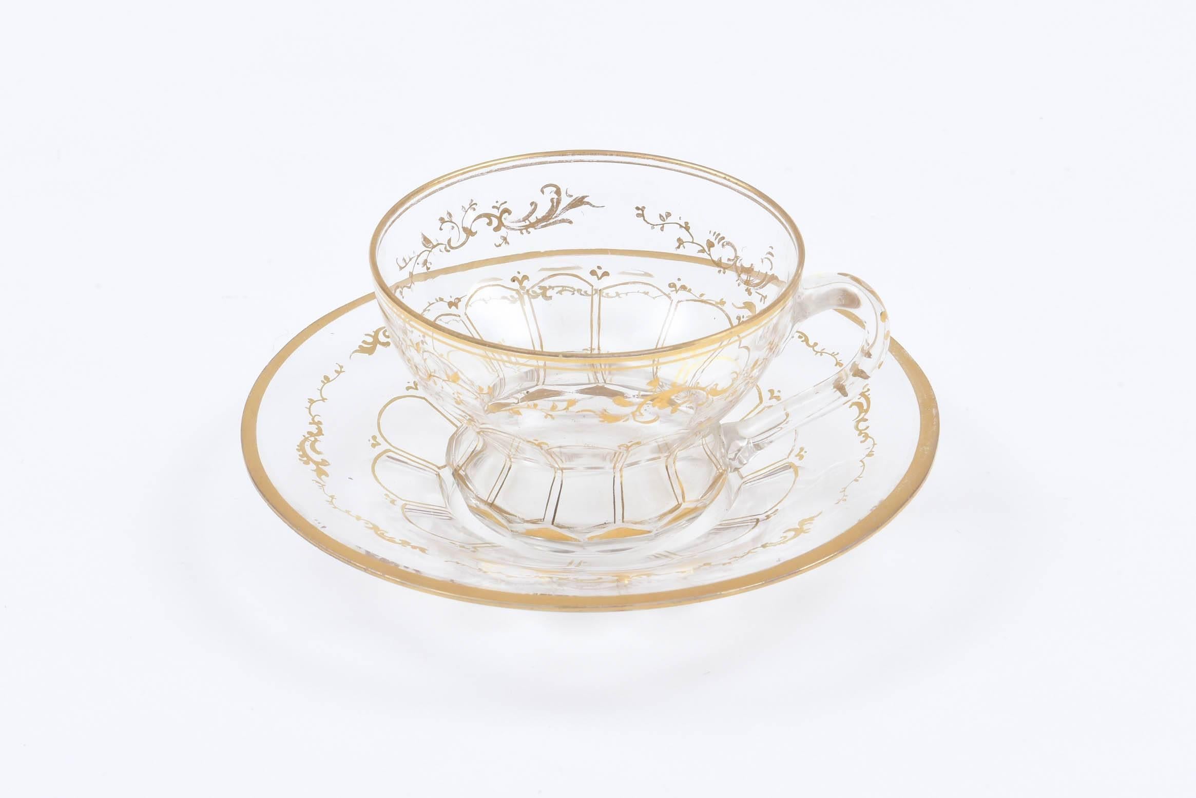 Eight Sets of Gilt Glass Tea or After Dinner Coffee Service Cup and Saucers
We attribute these beautiful cup and saucers to Moser, last quarter 19th century. Just the right size with blown crystal panels highlighted with hand trimmed gold in a gilt