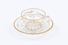 Eight Sets of Gilt Glass Tea Service Cup and Saucers