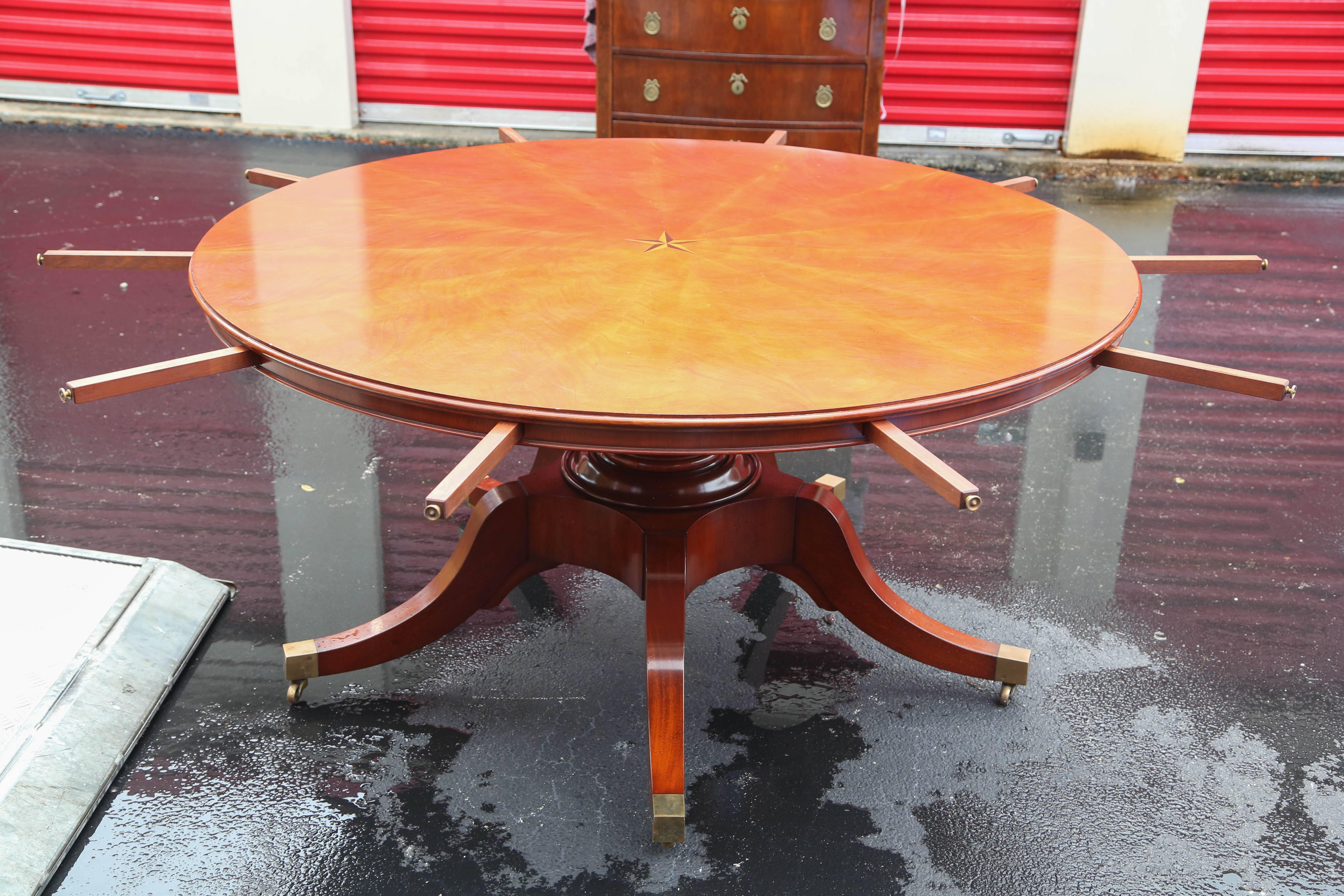 This really is an amazing quality round dining table with leafs to the outside, in excellent condition.
Fully extended its 84 inches round and 30 inches high, each leaf are 10 inches.
There are five leafs which slot in on the outside.
To the