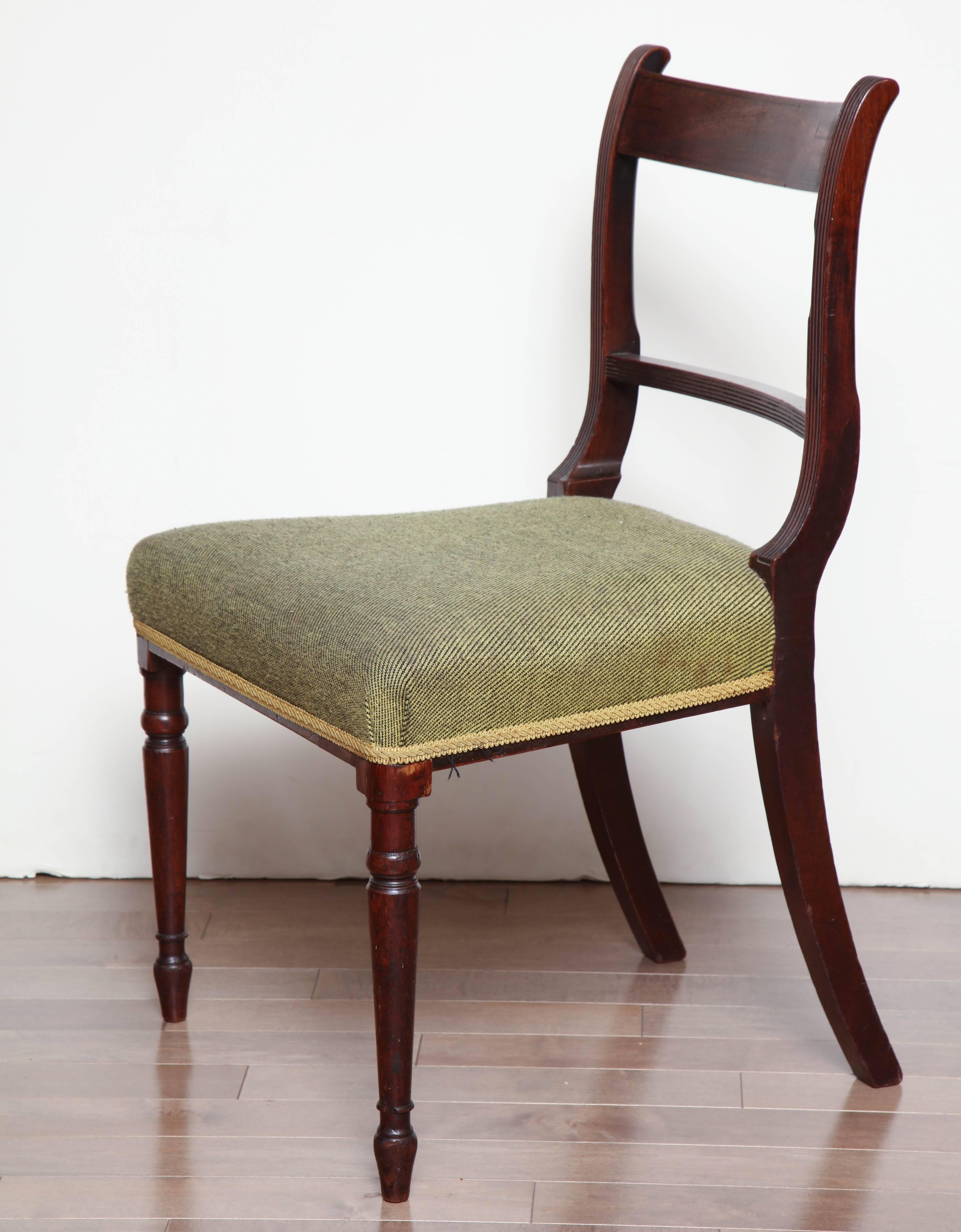 Pair of Irish, mahogany neoclassical side chairs, circa 1810-1820.