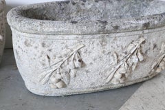 Pair of 1920s Cast Stone Planters with Olive Decoration from France
