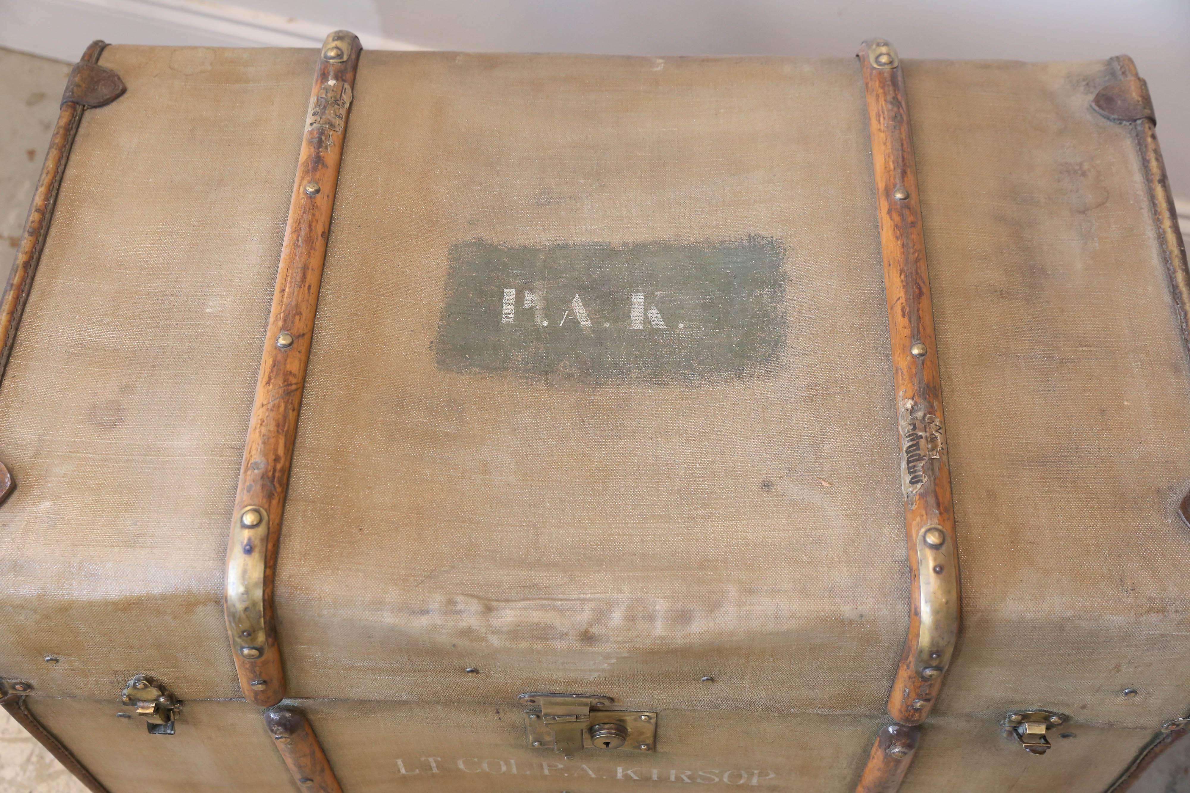 This canvas artillery trunk was sourced in France and dates to the 1940s during World War II. The interior is sectioned and there is a lock on the front of the piece, but no key. There are two additional latches which allow you to securely close the