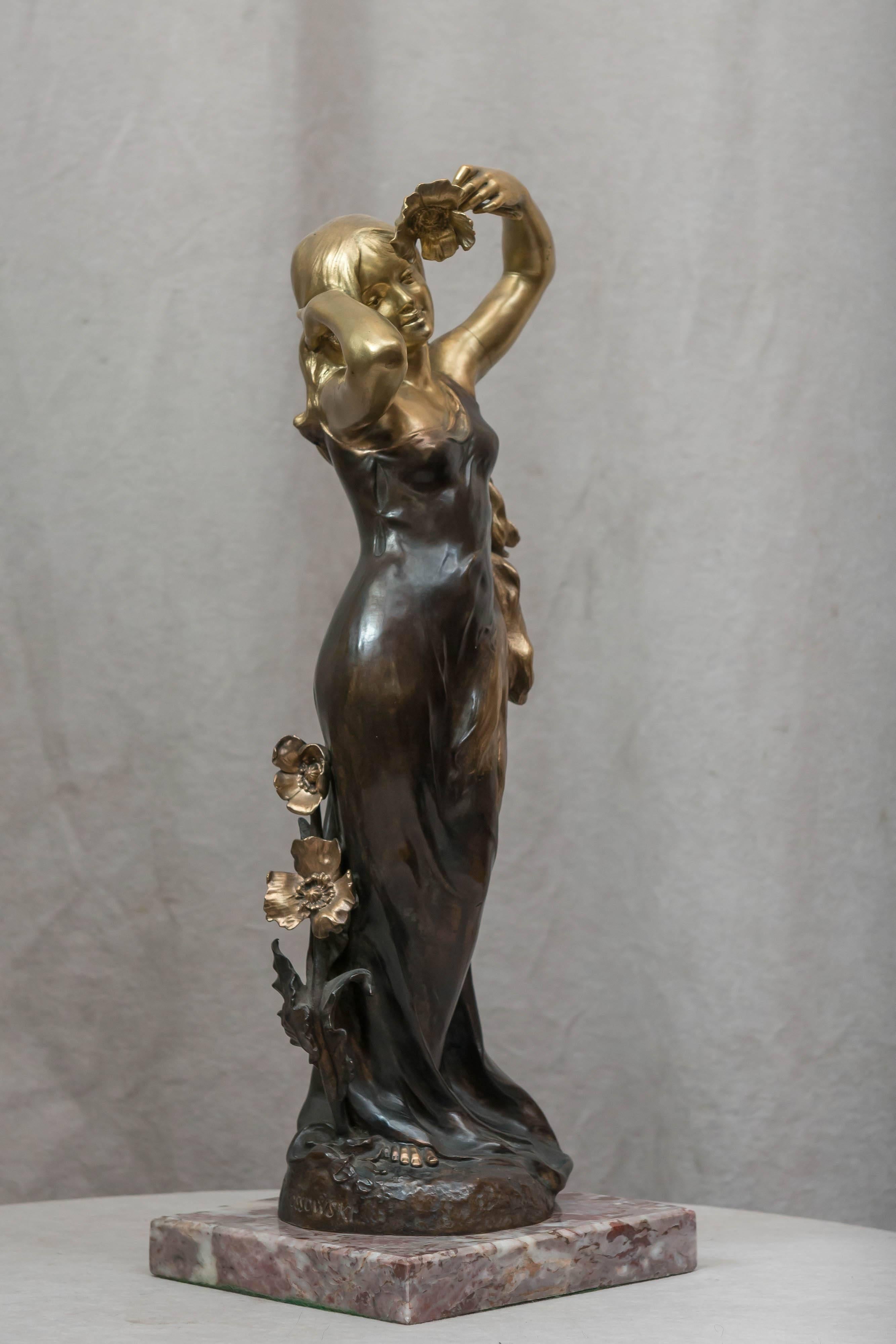 Hand-Crafted Art Nouveau Bronze Figure of a Young Woman For Sale