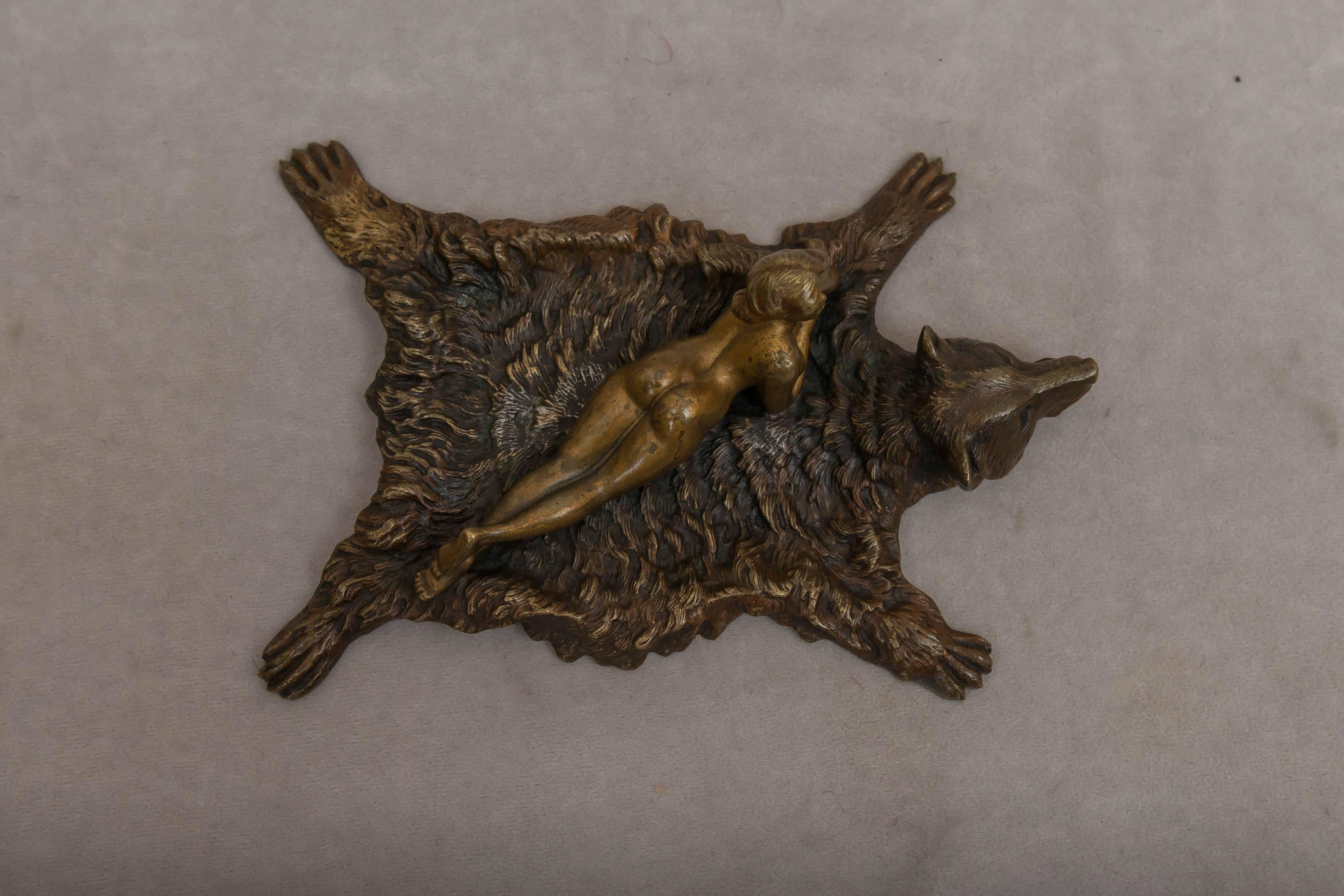 Early 20th Century Austrian Bronze of a Nude Woman Lying on a Bearskin Rug by Franz Bergmann