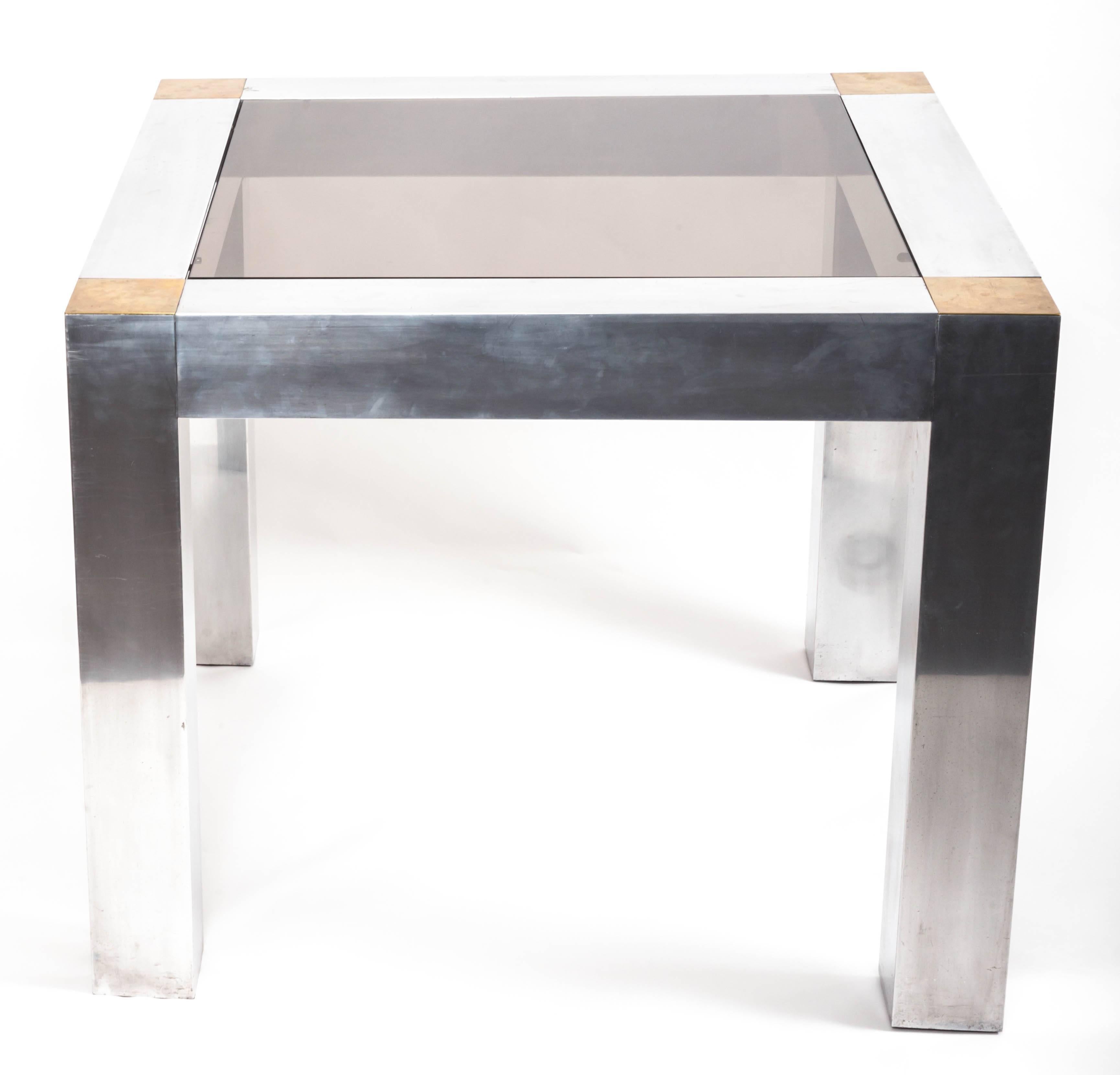 Aluminum and brass parsons table in the style of Paul Evans, USA, 1970s.
 