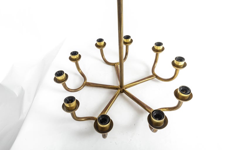 Simple yet sophisticated vintage brass chandelier, Italy, 20th century. 

Chandelier consists of five arms that branch off into two candelabras each, amounting to 10 light sockets total. 

This fixture has been newly rewired and comes with a set of