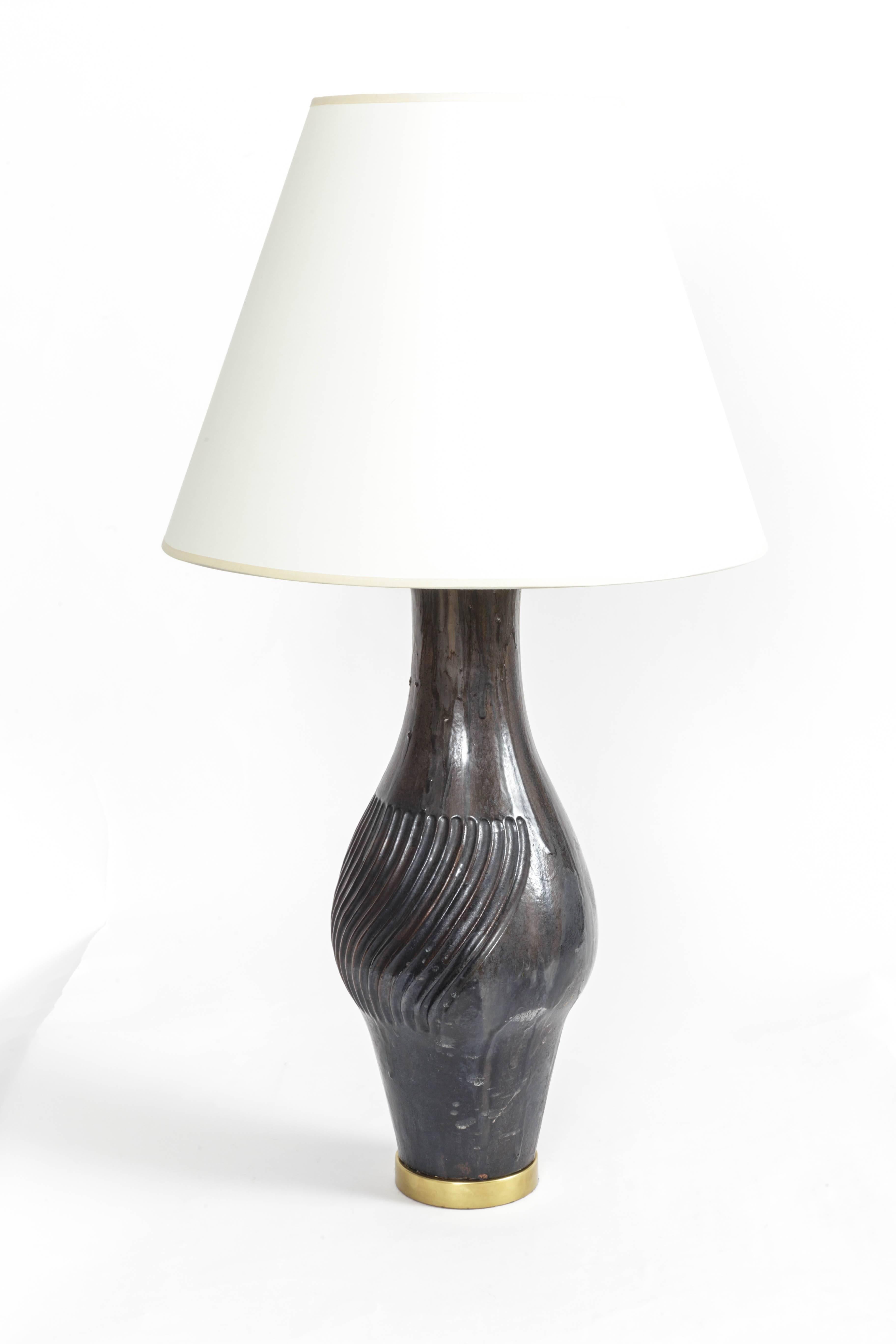 Large ceramic and brass table lamp by Marcello Fantoni, Italy, 1958. 

With its sculptural shape and wavy incisions, this stunning table lamp is a testament to Fantoni's sense of composition, sensitive handiwork, and overall artistry as a