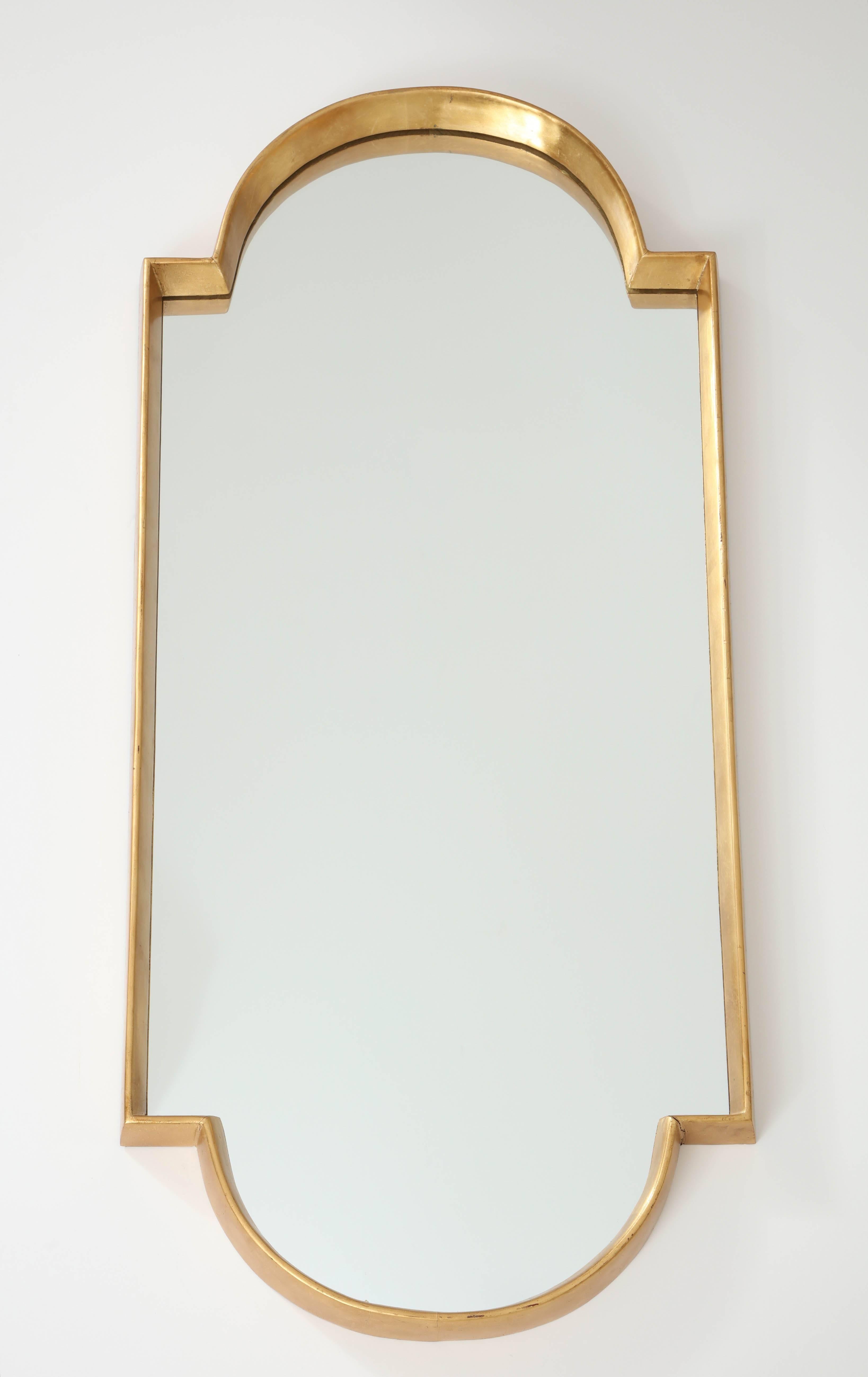 Mirrors, pair of tall gold leaf mirrors. Pair of decorative gold leaf mirrors. Handcrafted by a local crafts person in the New York area. Based on a 1950s mirror design. We have them in stock.
The mirrors are made of wood. The gold leaf is handmade.