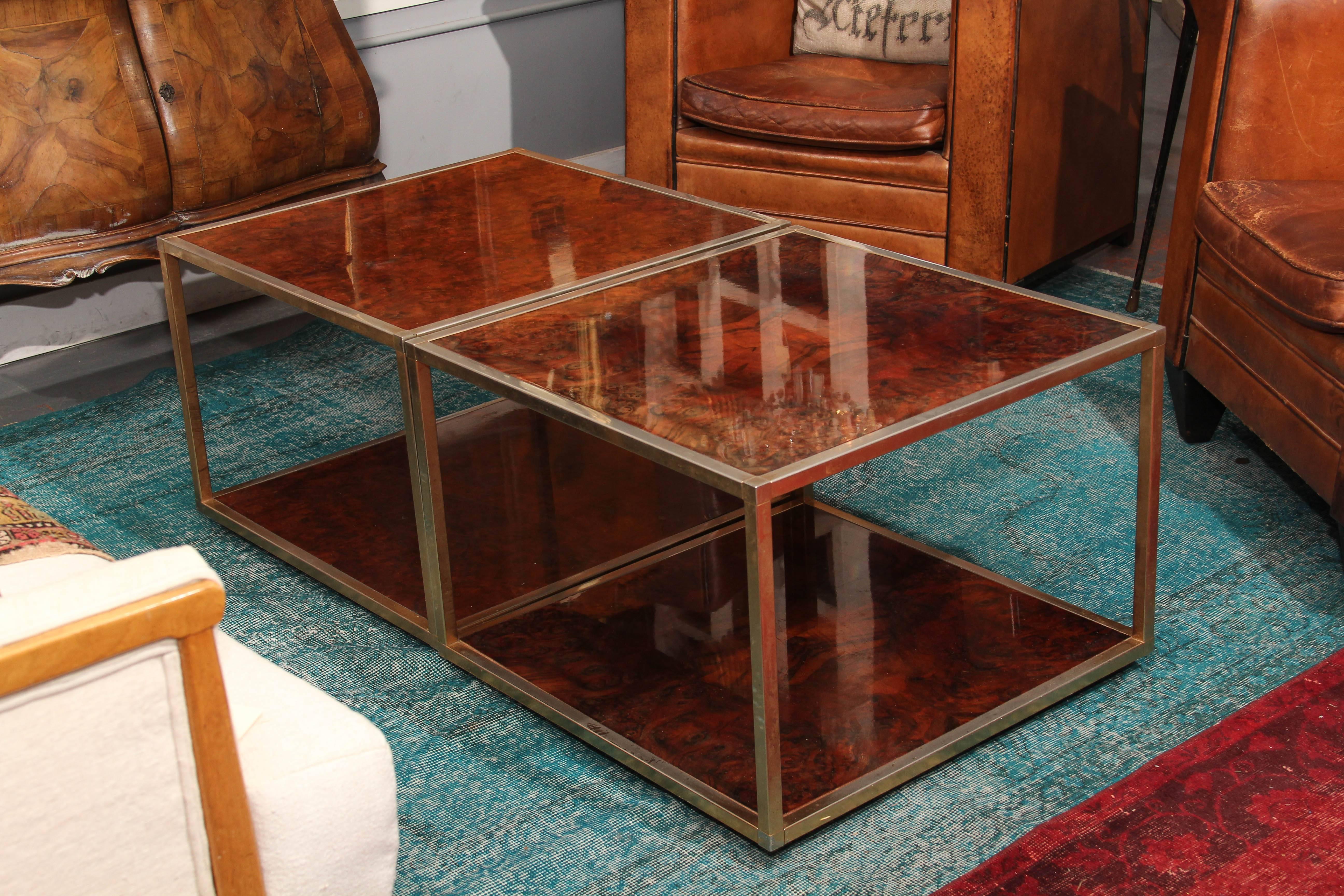 A matched pair of olivewood and gilt metal low tables in a simple yet beautiful square surface shape and the perfect cocktail table height.