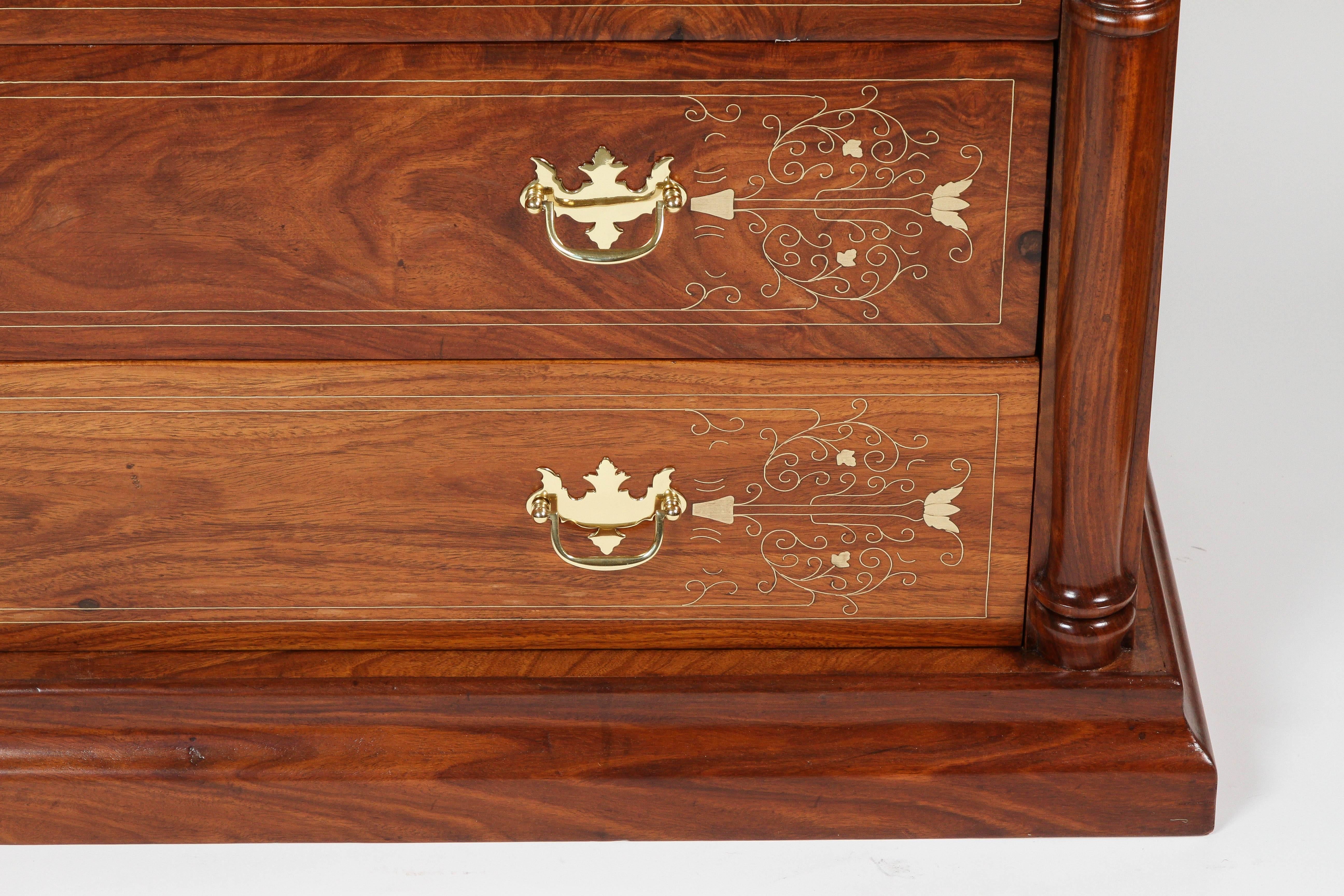 Vintage chest of drawers made from exotic wood with intricate brass inlay detail. All original brass hardware has been newly polished and the wood refinished (most likely from Asia).