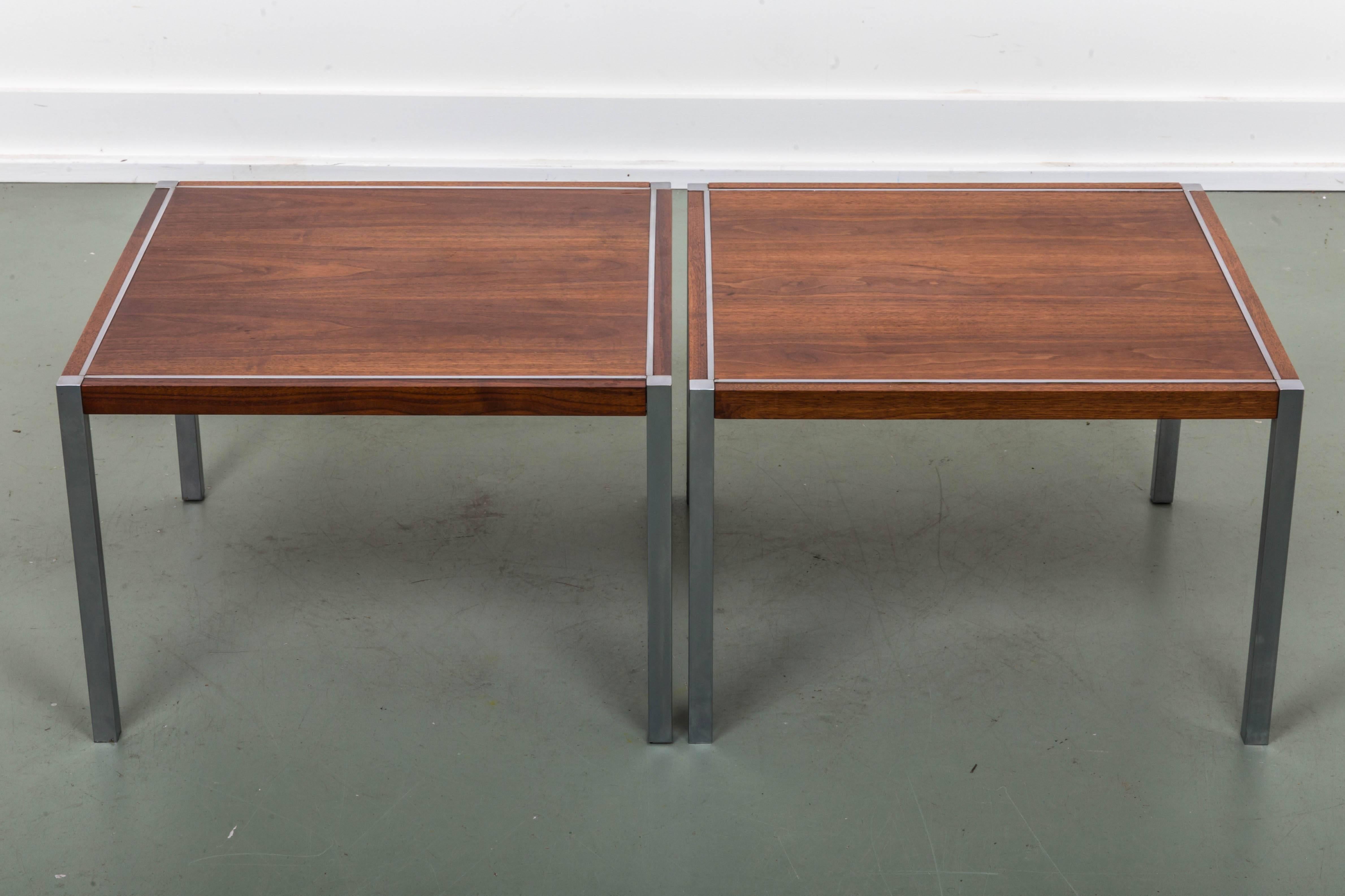 Pair of walnut and chromed steel legs and inset detailed side tables.