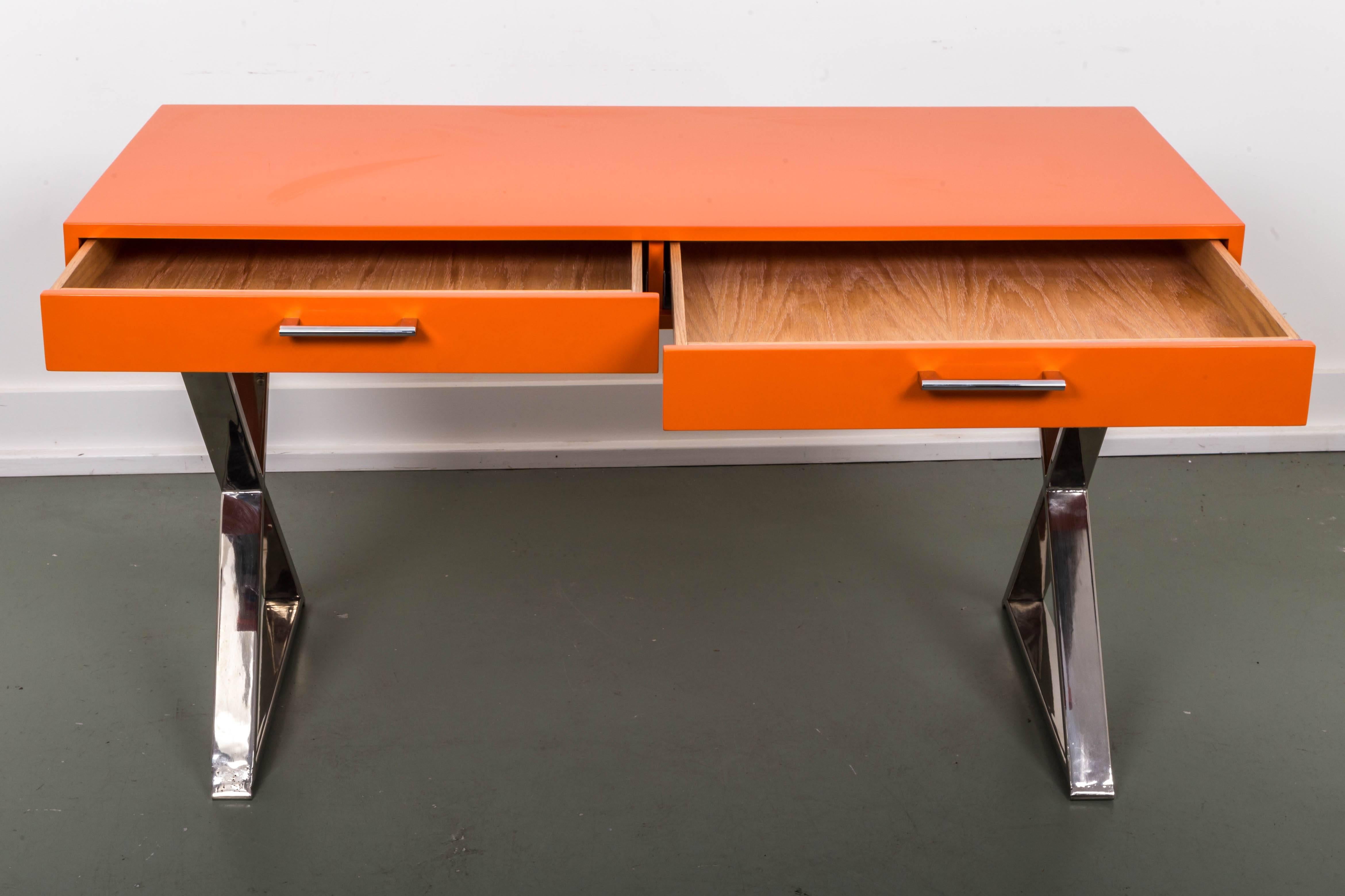Beautiful orange lacquered base campaign desk by Milo Baughman. Restored like new finish.
