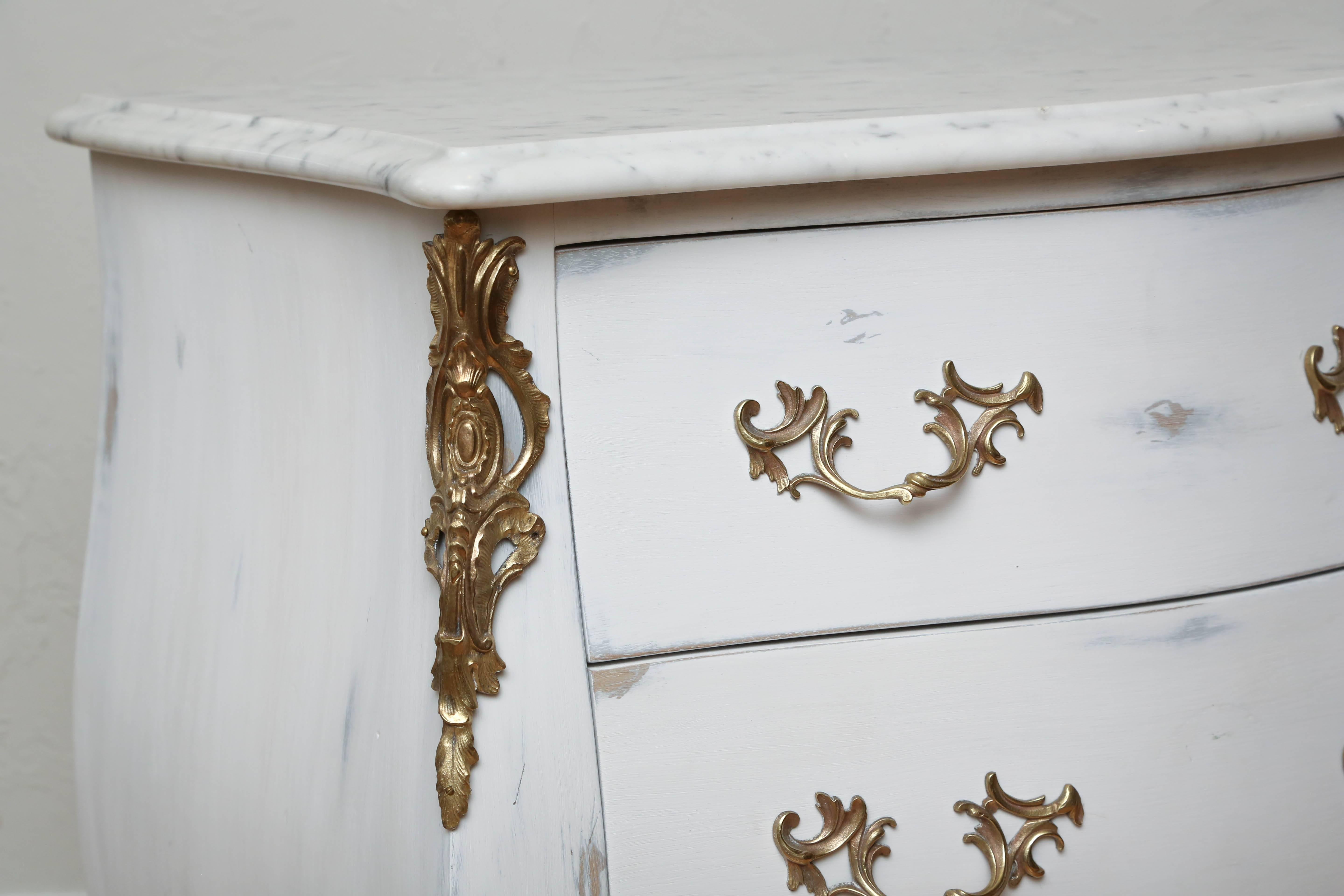 Louis XV style pair of painted petite commodes with white/grey marble tops by Auffray. Bronze mounts and pulls.