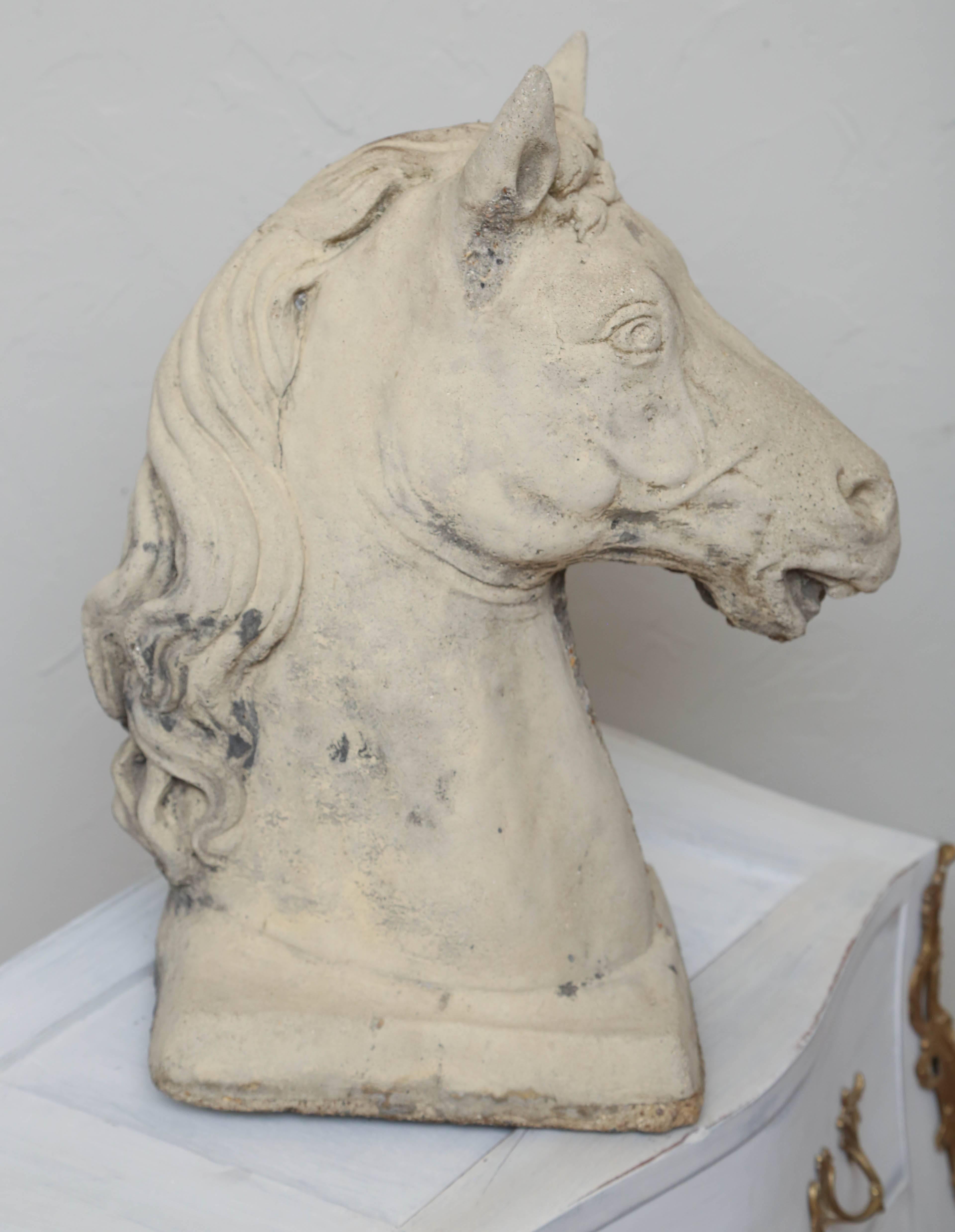 Handsome horse head cast stone sculpture.