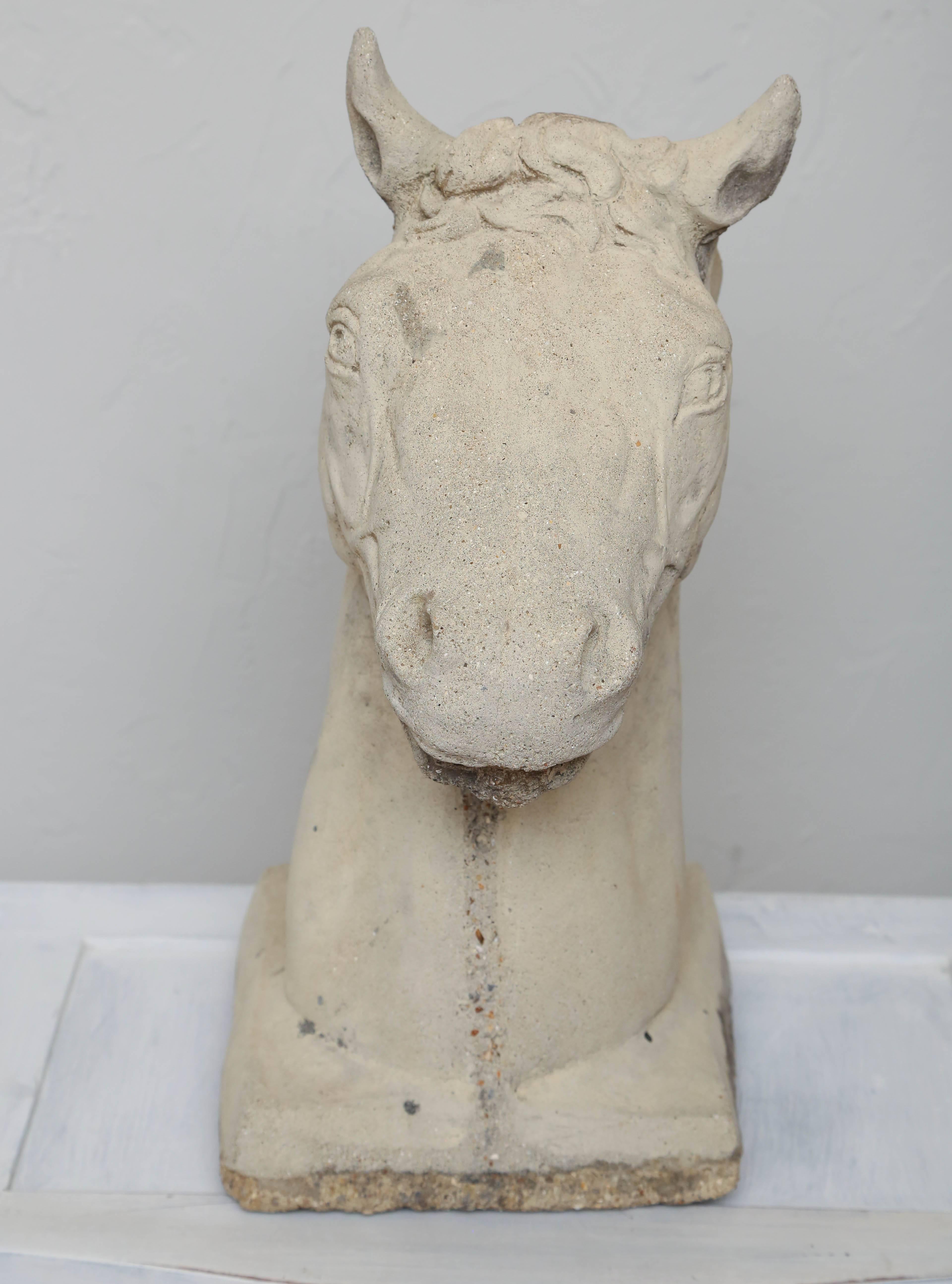 concrete horse head statue
