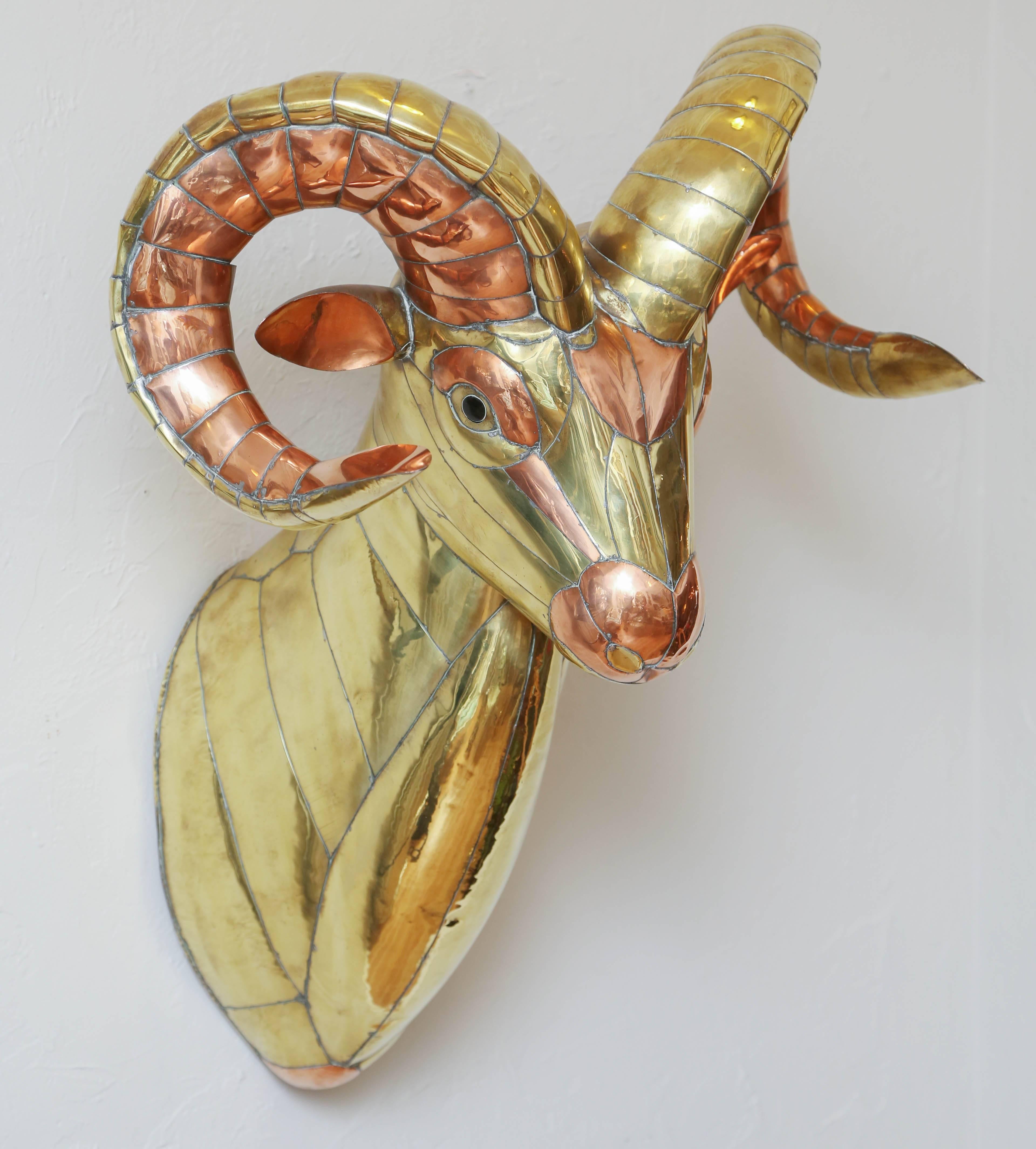 Midcentury brass and copper ram's head sculpture by Sergio Bustamante.