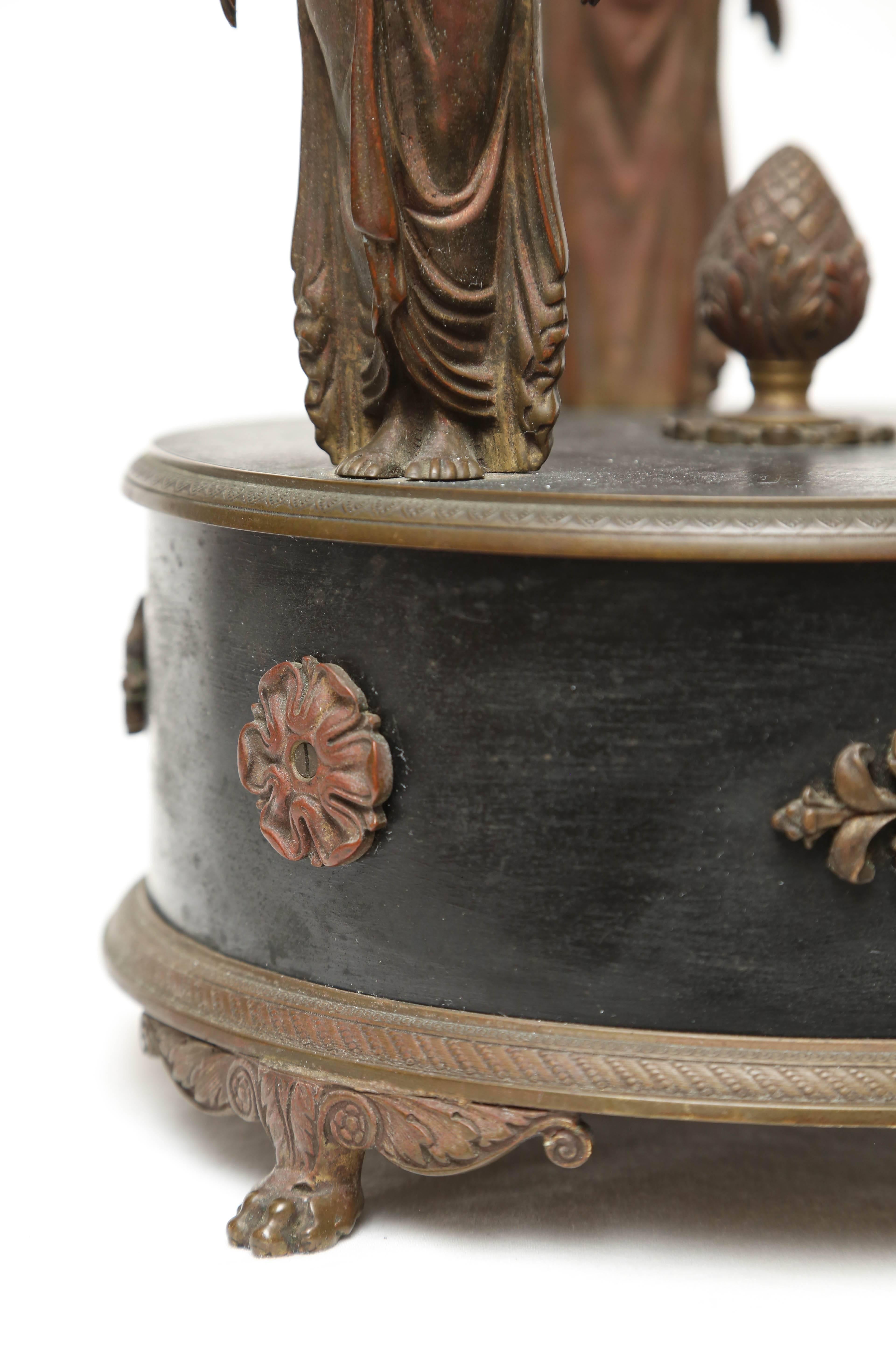 Grand scale.
The original diamond cut bowl is supported by three Greco-Roman figures.
A Classic neoclassic French form.