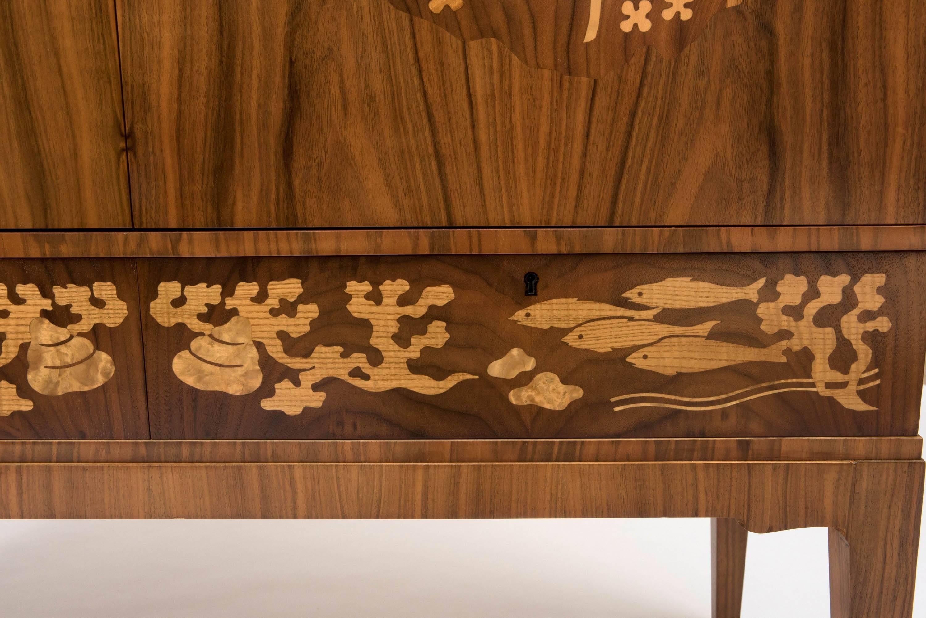 Inlay Erik Mattsson mahogany cabinet with various exotic wood inlay, Sweden circa 1940