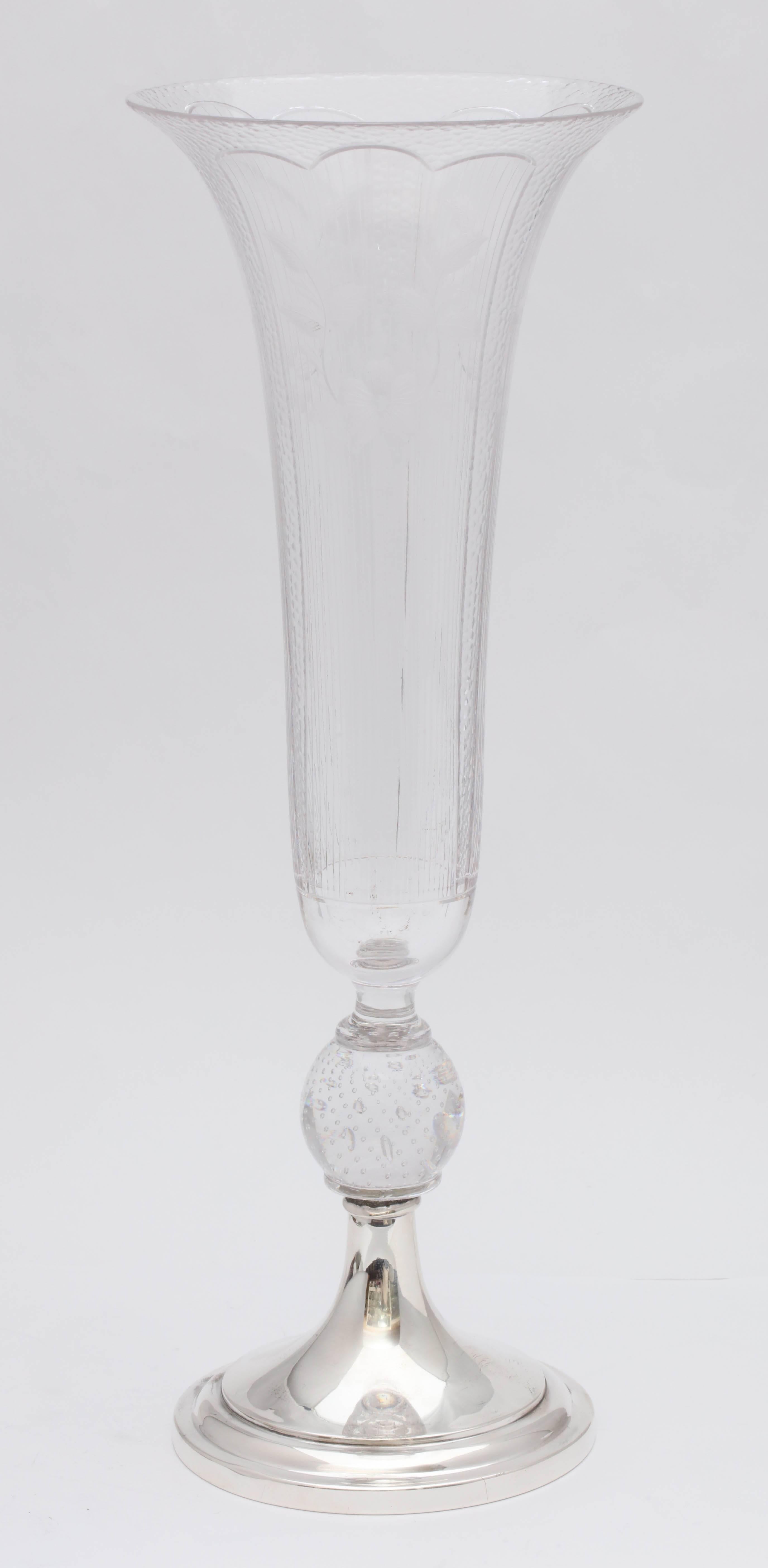 Beautiful, Edwardian, sterling silver-mounted, etched and cut crystal vase with controlled bubbles ball joining the base to the crystal vase, Wilcox and Wagoner, New Jersey, circa 1905. Measures: 13 1/2 inches tall x 4 1/2 inches diameter across