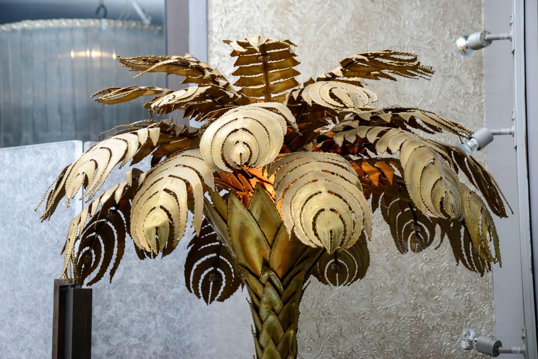 Brass palm tree attributed to Jansen, three lights.