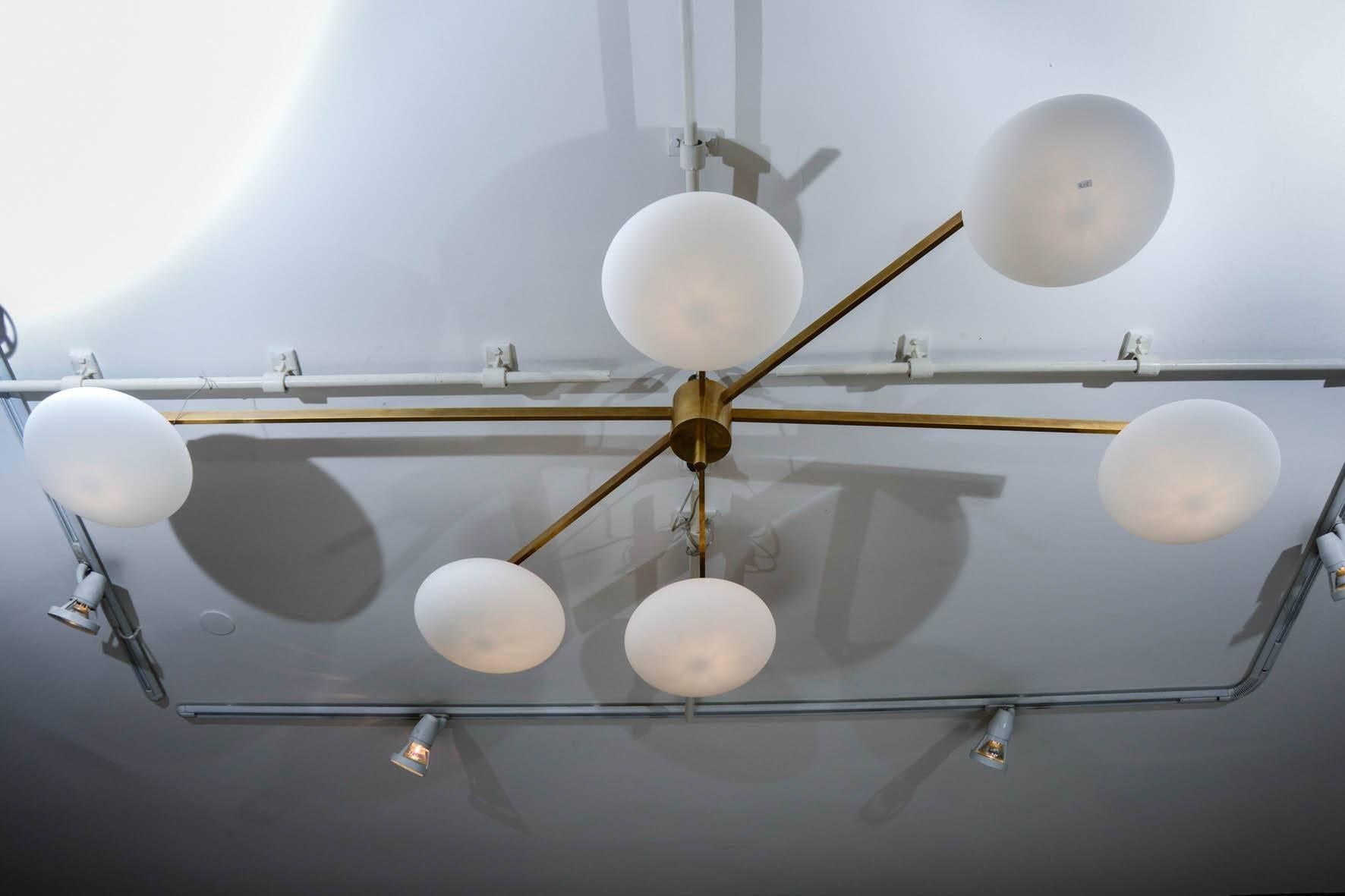 Brass and opaline globes chandelier, six arms, from Angelo Lelli for Arredoluce.