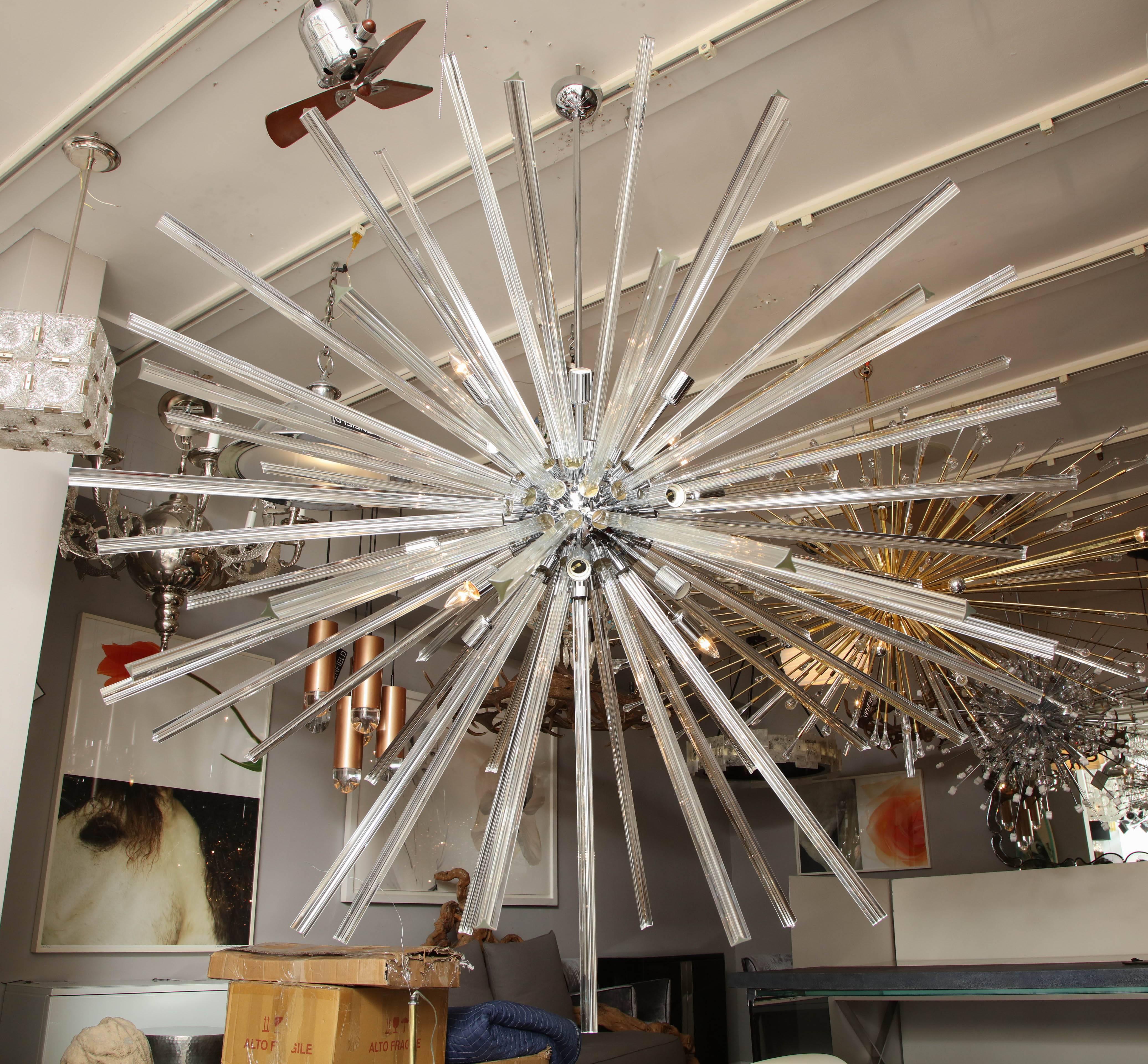 Monumental Triedri Glass Rod Sputnik Chandelier. Customization is available in different sizes and finishes.
