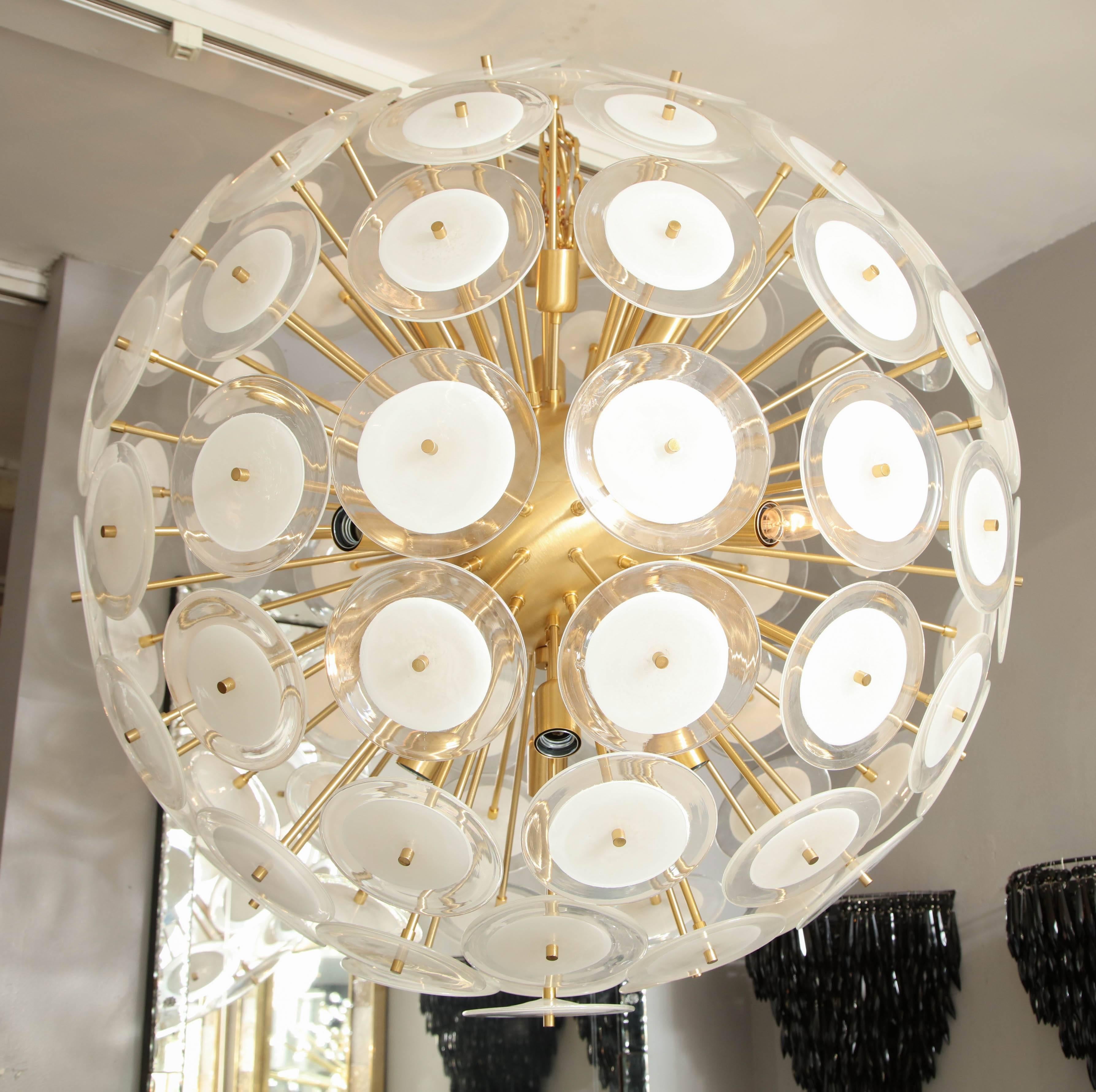 Custom extra large white Murano glass disc Sputnik chandelier, in brass finish. Customization is available in different sizes, finishes and glass colors.