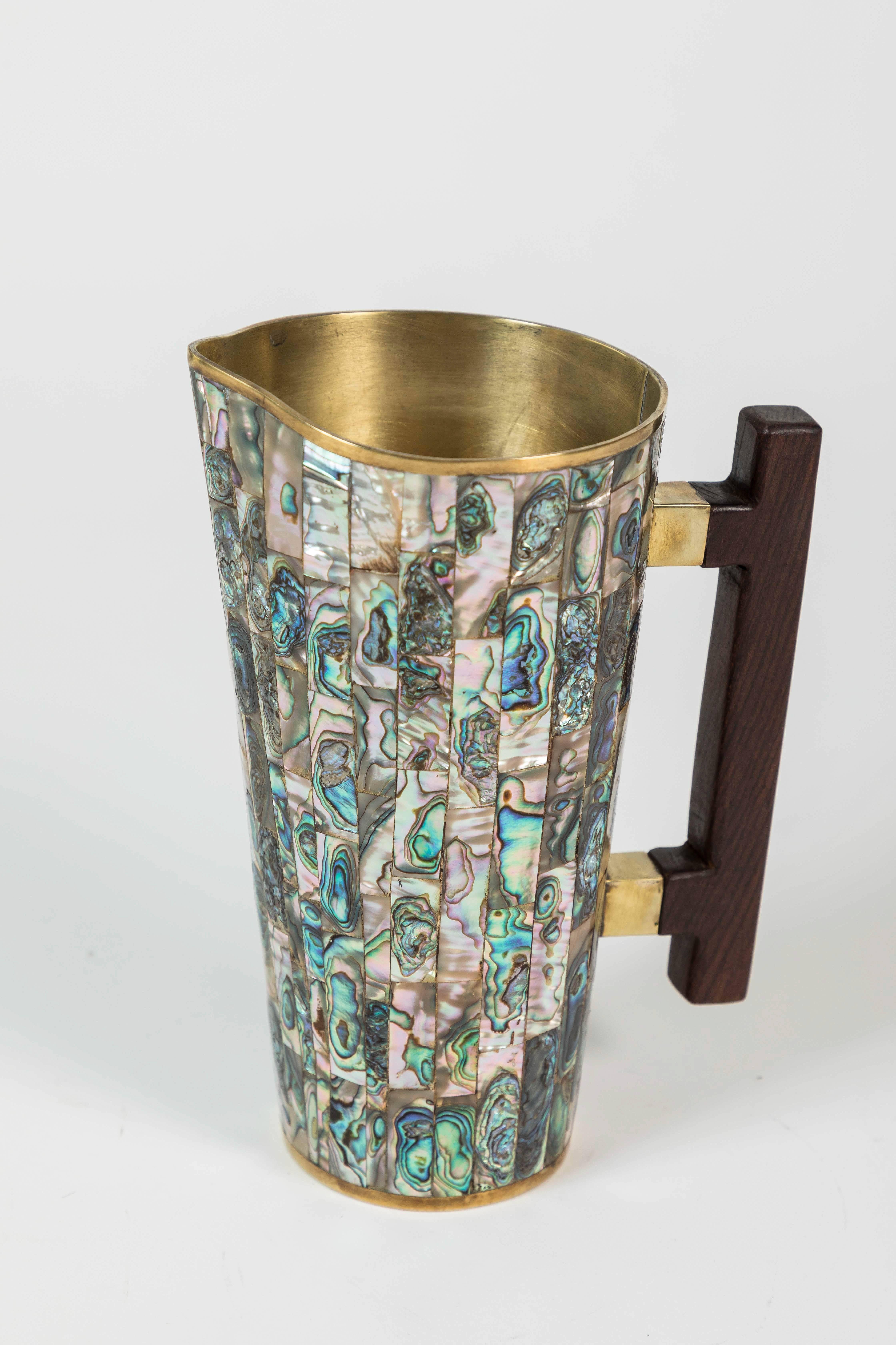 Vintage brass and abalone pitcher with rosewood handle from Mexico.