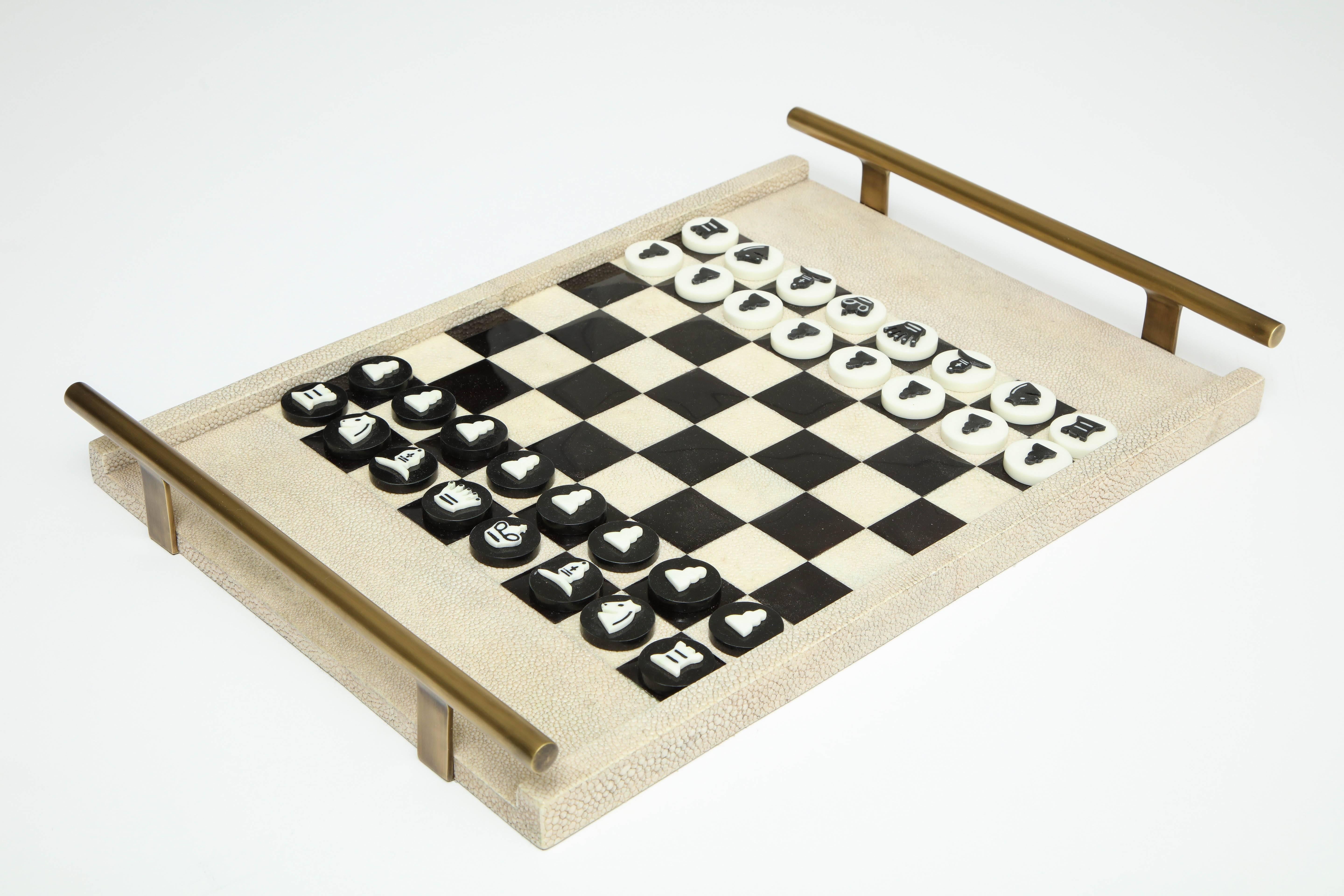 Decorative chess game, France. The game is made of shagreen, sea shells and bronze.