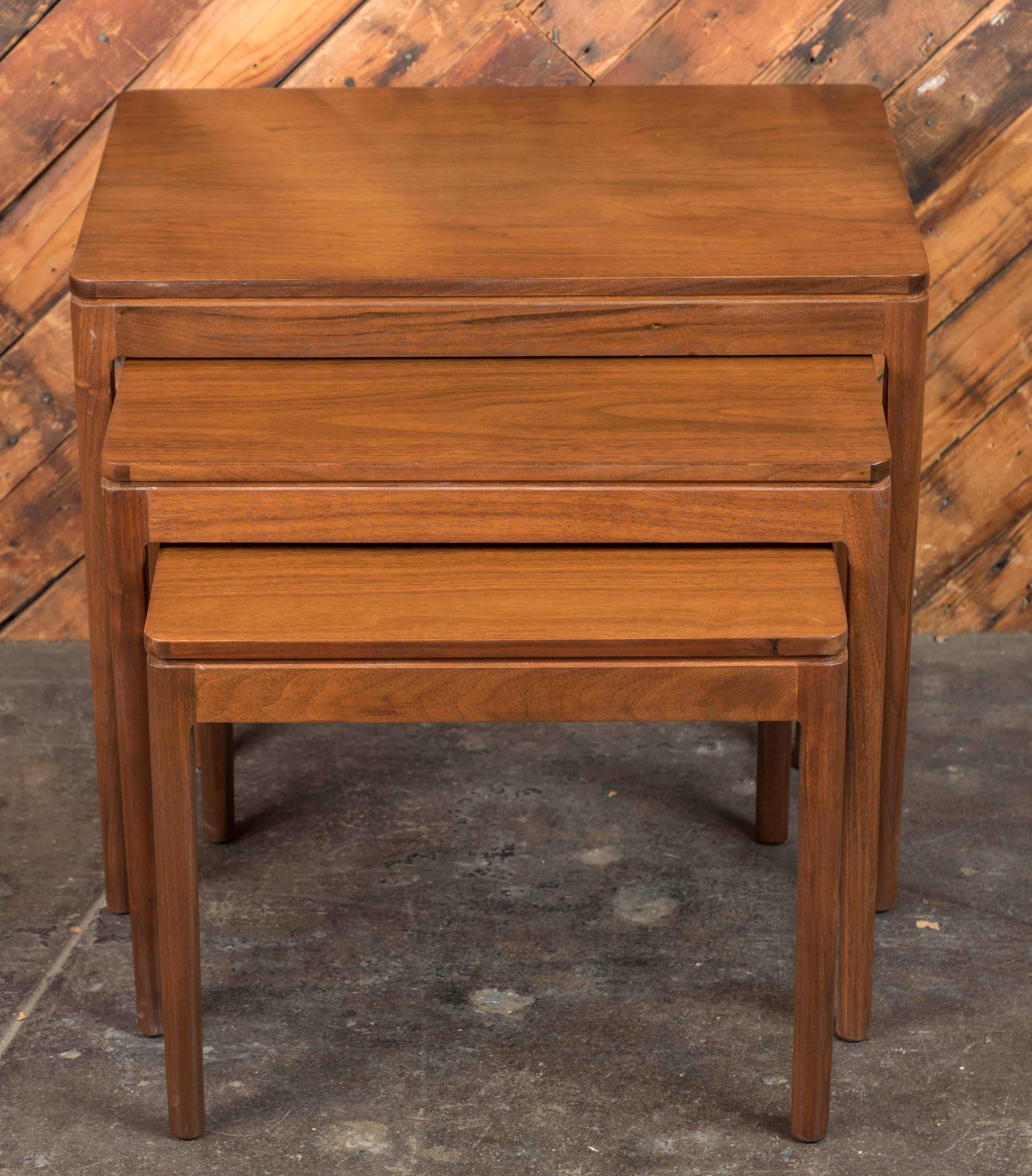 Drexel declaration
Stamped and dated 1962
Elegant set of three nesting tables by Kipp Stewart for Drexel
Refinished walnut
Beautiful grain.