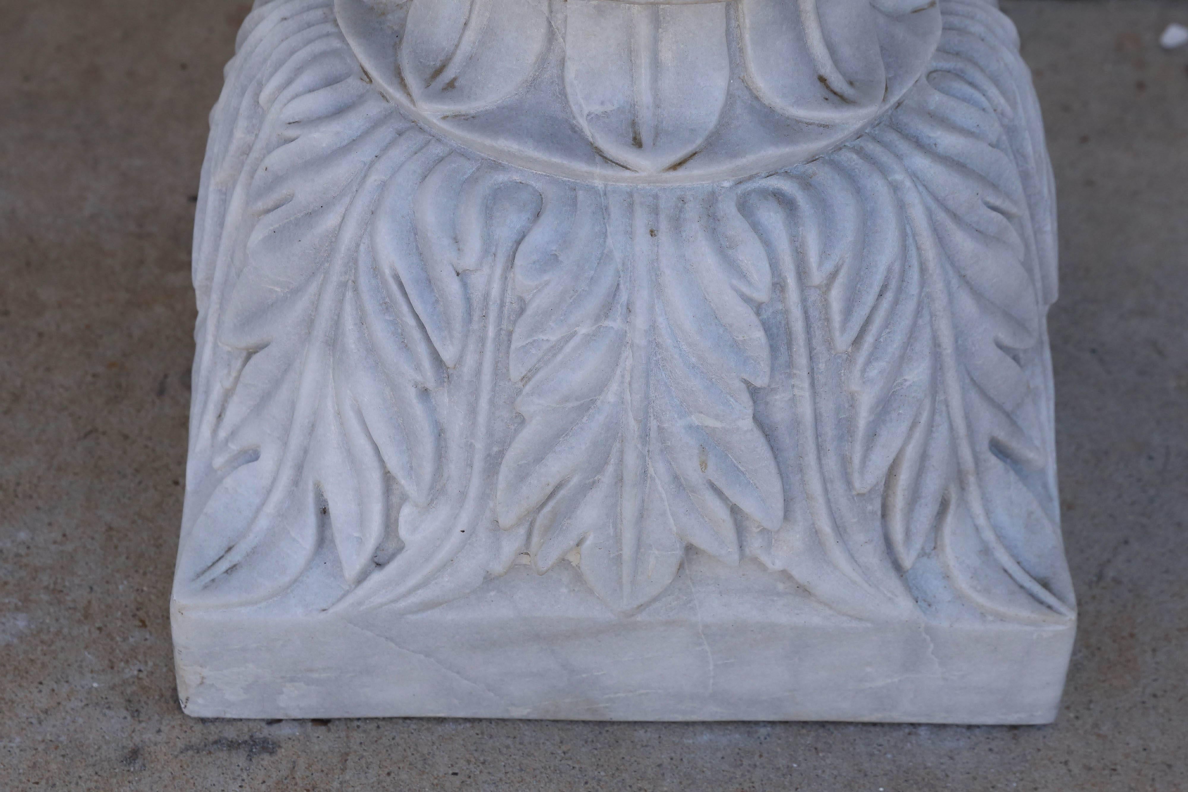 These garden vases were carved from fine high quality marble blocks. It is made of two parts. Sold as a pair. These vases once adorned a park in India. Marble pieces like these vases will last for centuries.

 