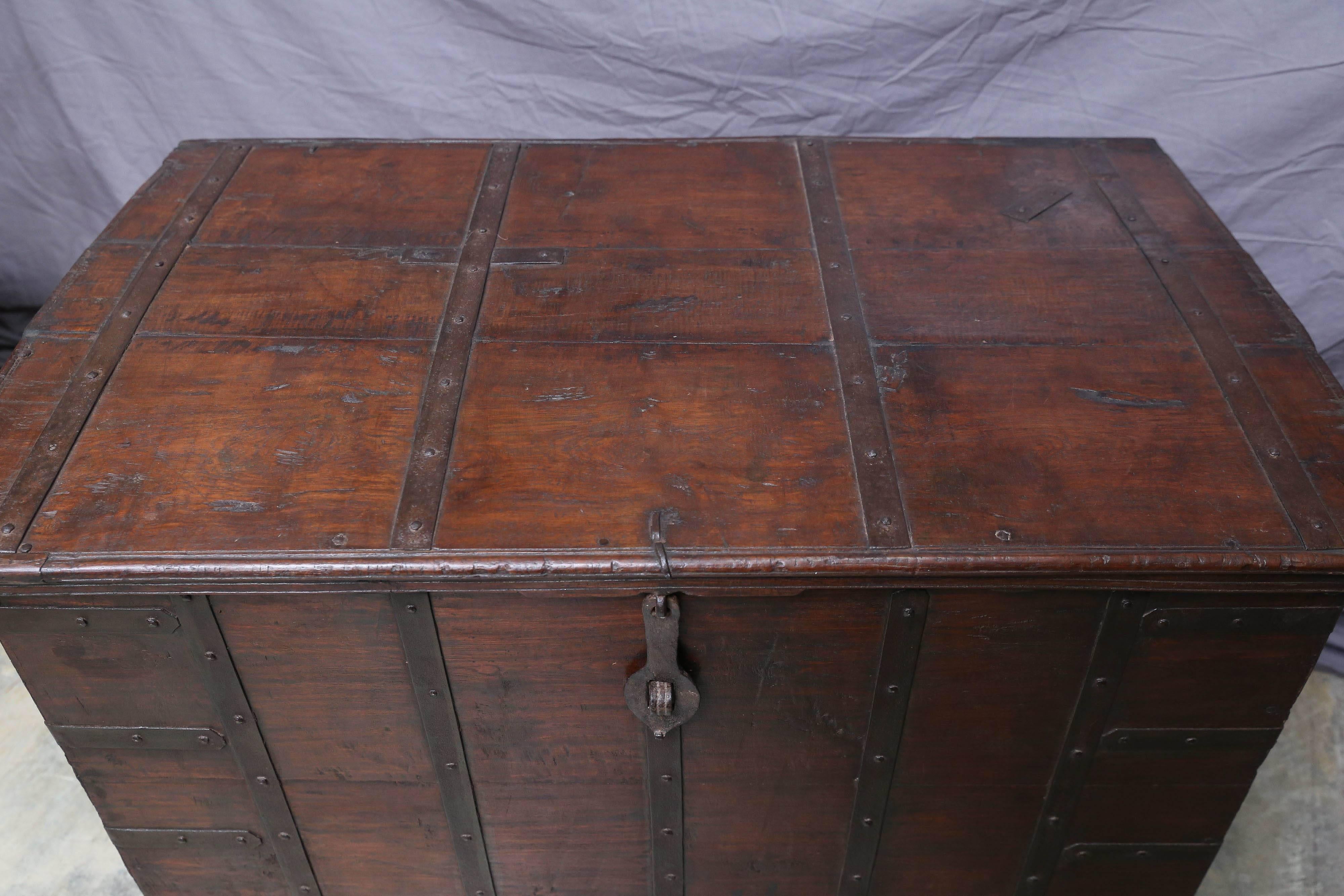 This old dowry chest is on original four wheels. It also retains all hand forged iron strips and also the original iron hardware. Chests like this one will be filled with linen and clothes by the bride's family and given as gift to the groom for