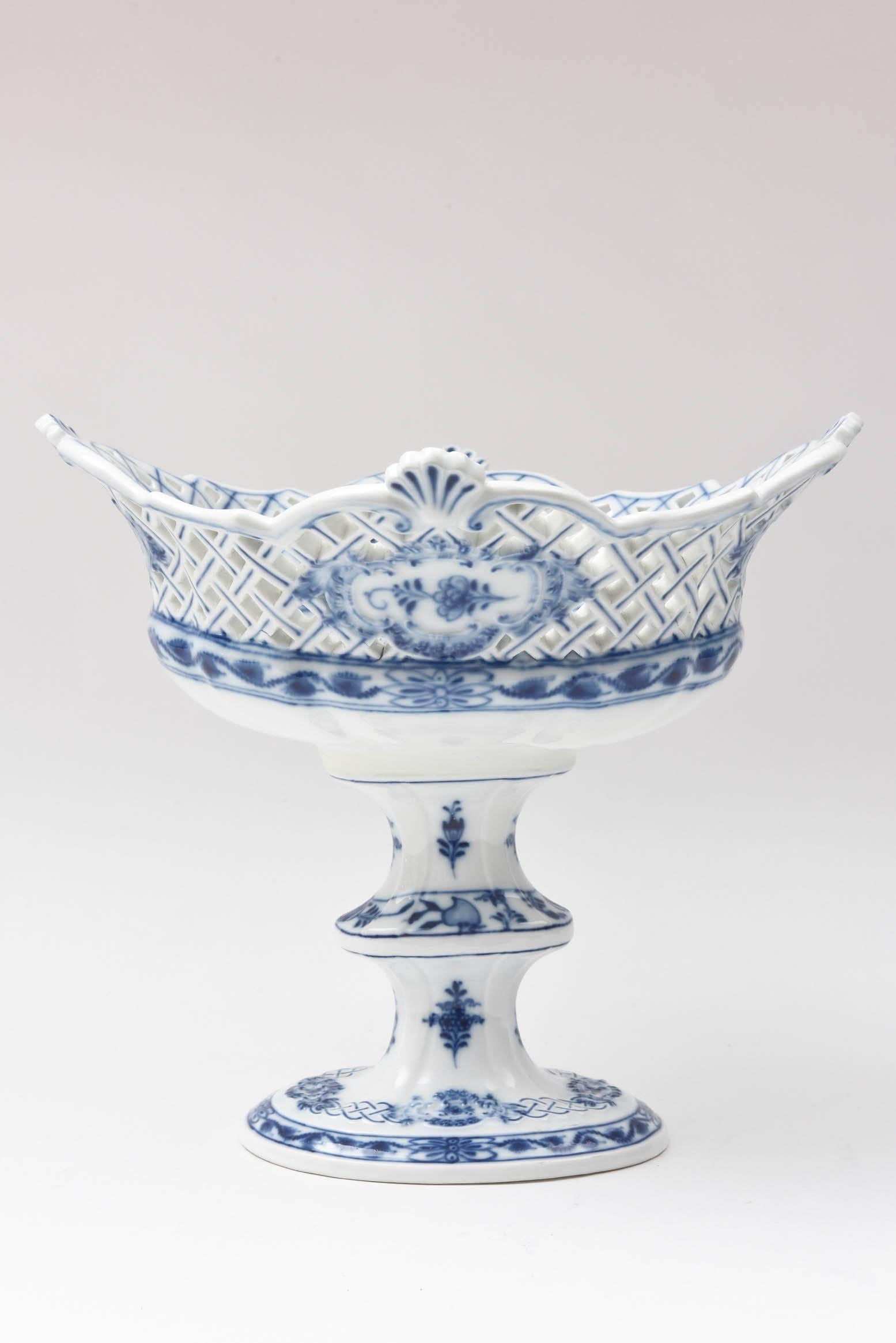 The timeless and beloved pattern by Meissen. This is an unique piece featuring hand cut pierced accents in the center bowl and crisp blue hand-painted design throughout. Very nice antique condition.