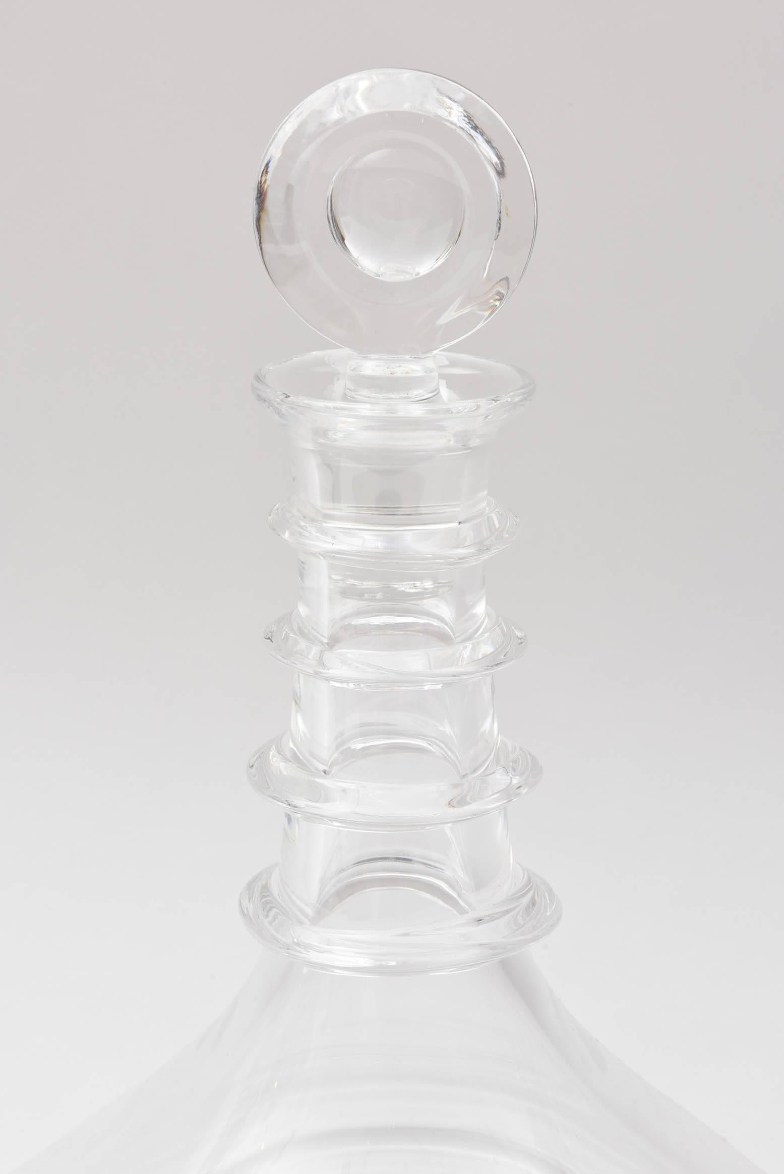 A classic pattern by the Corning New York Glass Maker. Clear and colorless with a nice wide base for decanting and serving. Original stopper and in wonderful vintage condition.